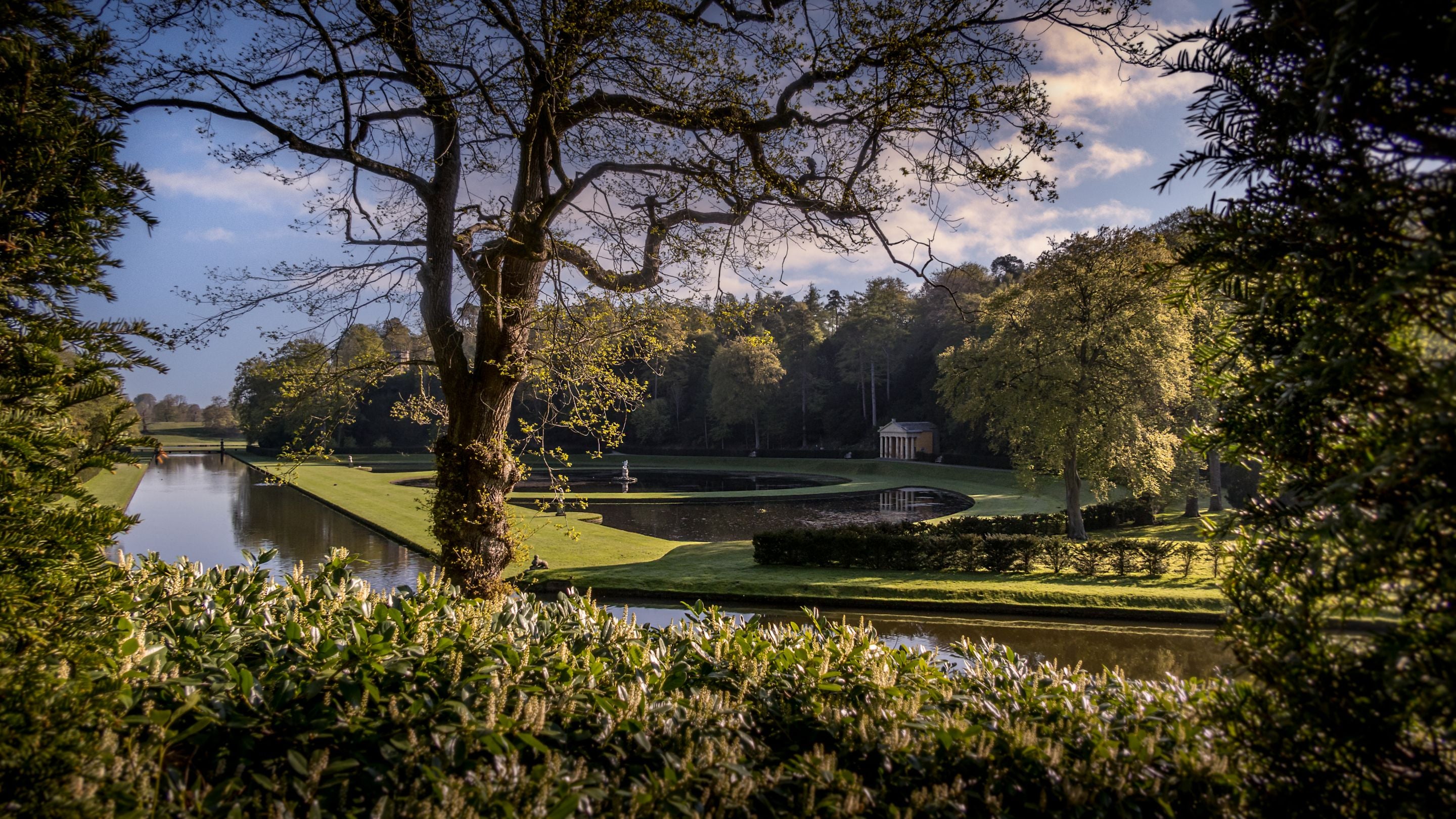 Ornamental lakes, canals, temples and statues at Studley Royal Water Garden, Yorkshire