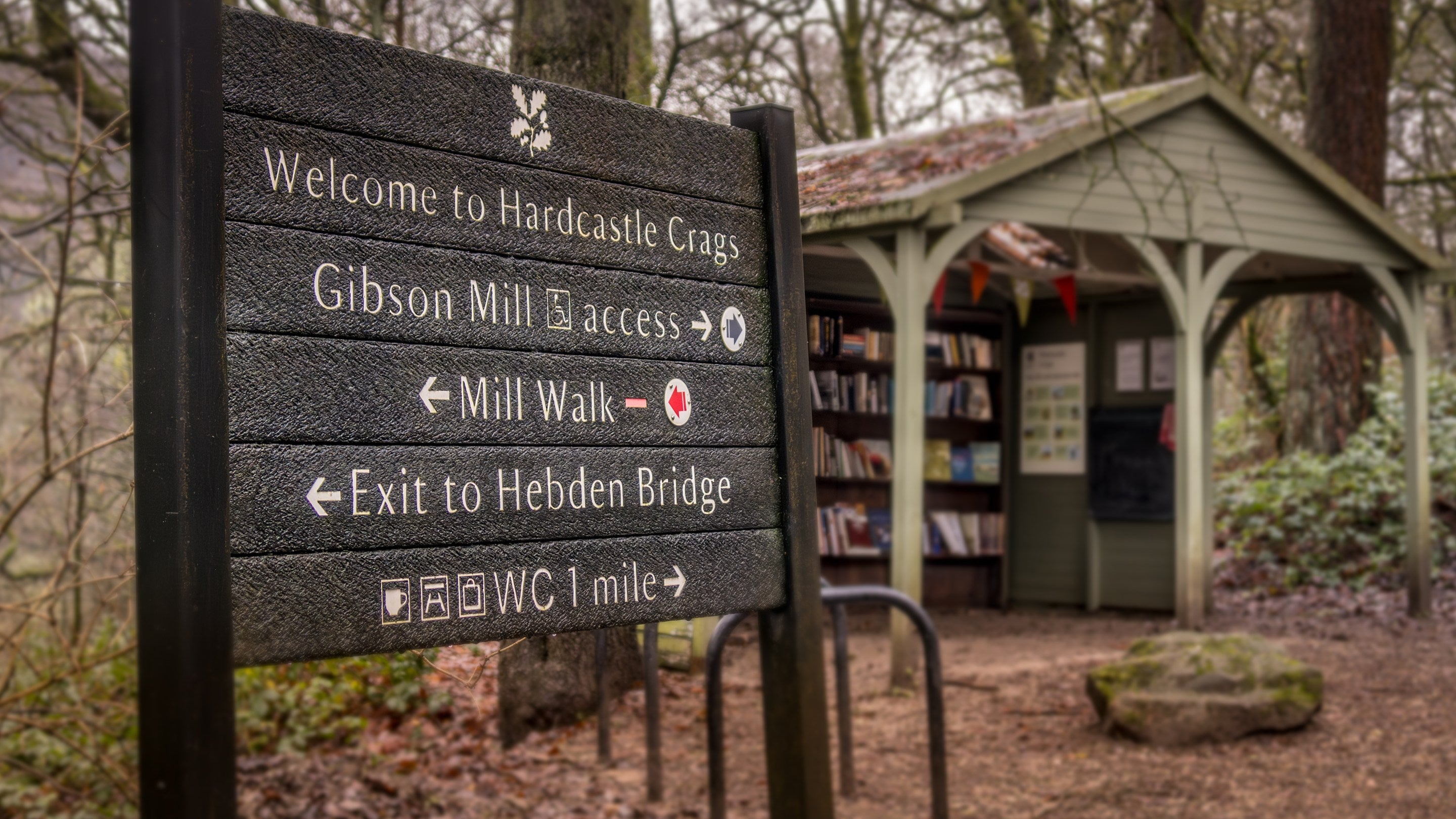 A sign showing walking routes at the Hardcastle Crags estate, Yorkshire