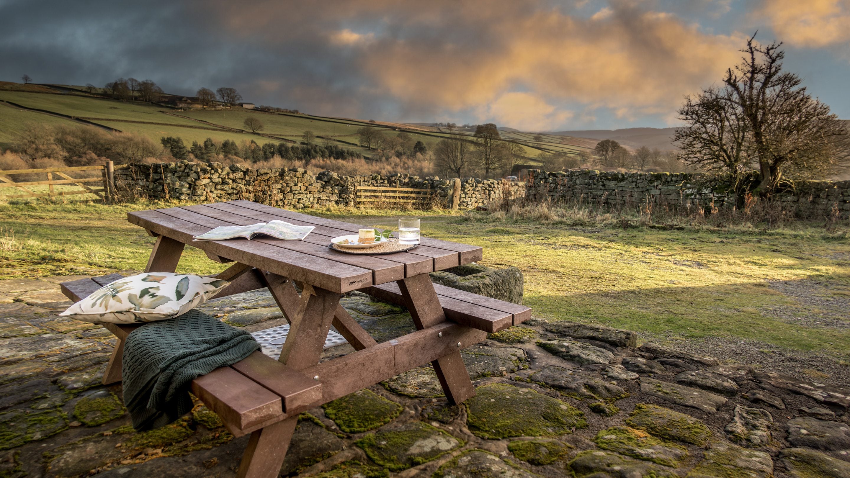 The picnic table in the garden at High Lidmoor Farmhouse, Yorkshire