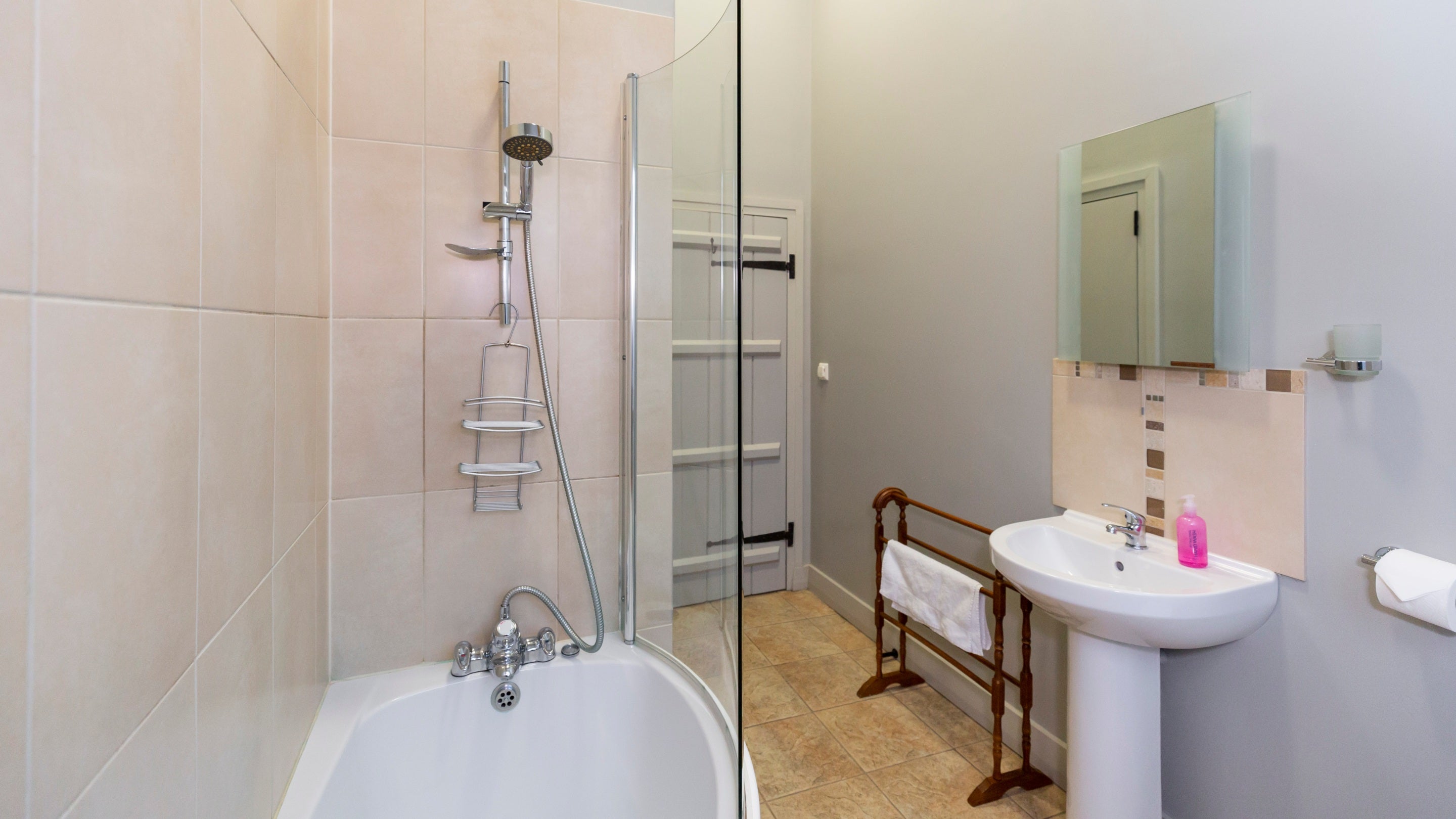 The bathroom at Lark, with shower over bath, Yorkshire