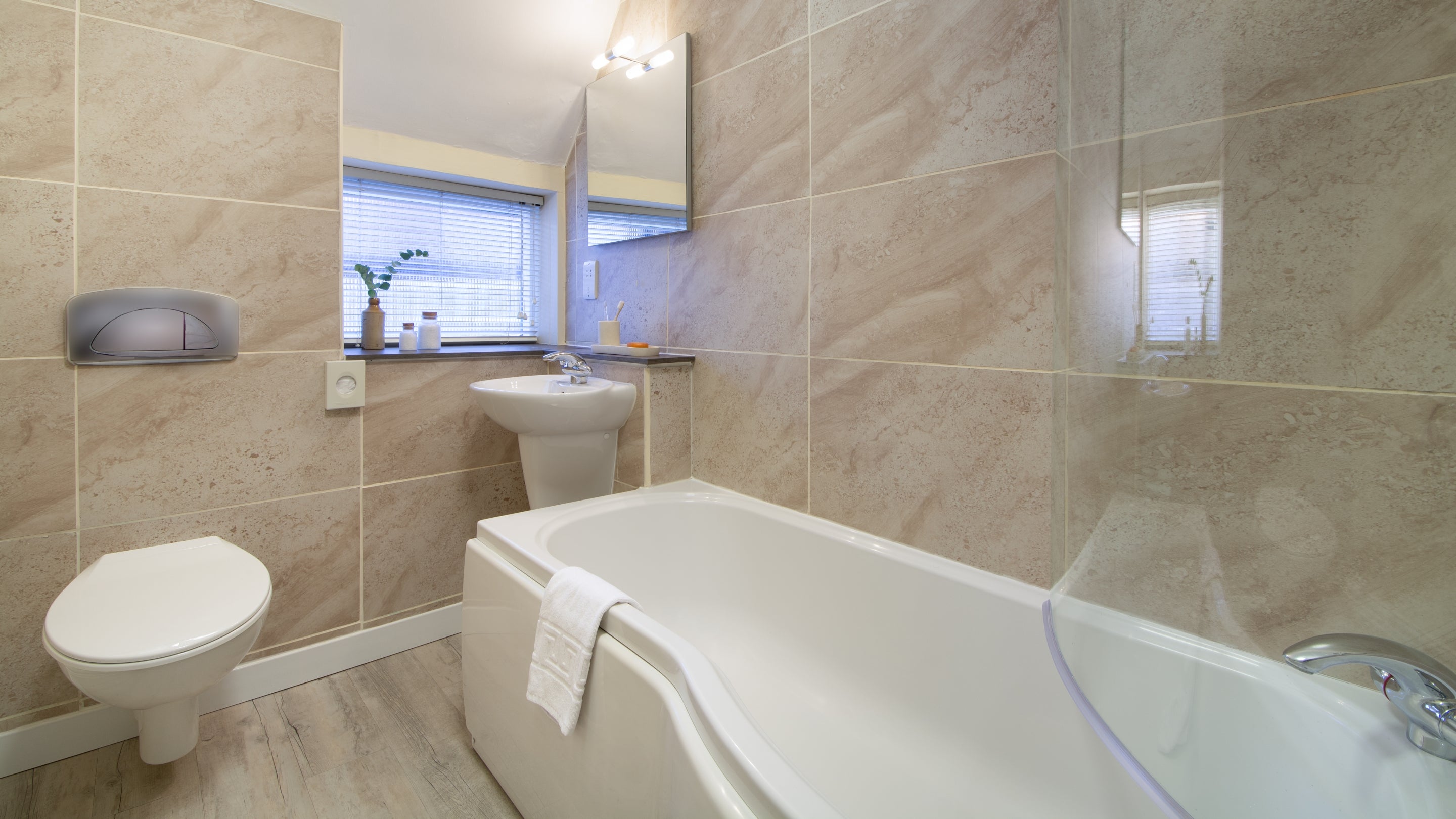 The bathroom with shower over bath at Minstergate, Yorkshire
