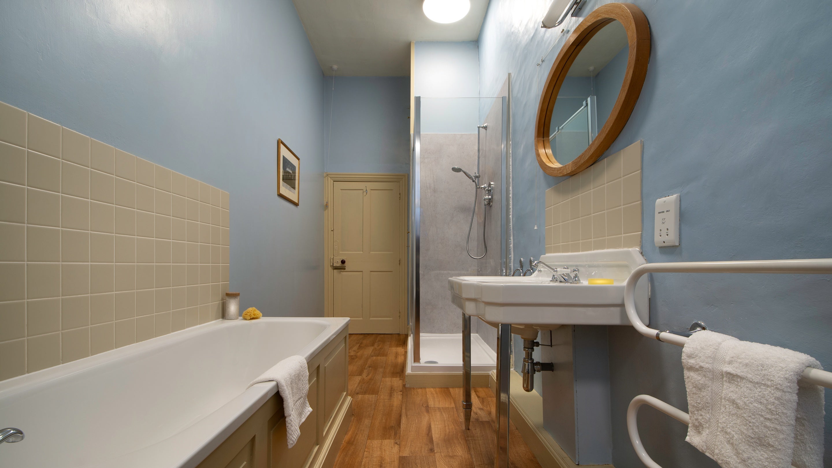 The bathroom with bath and walk-in shower at Proctor, North Yorkshire