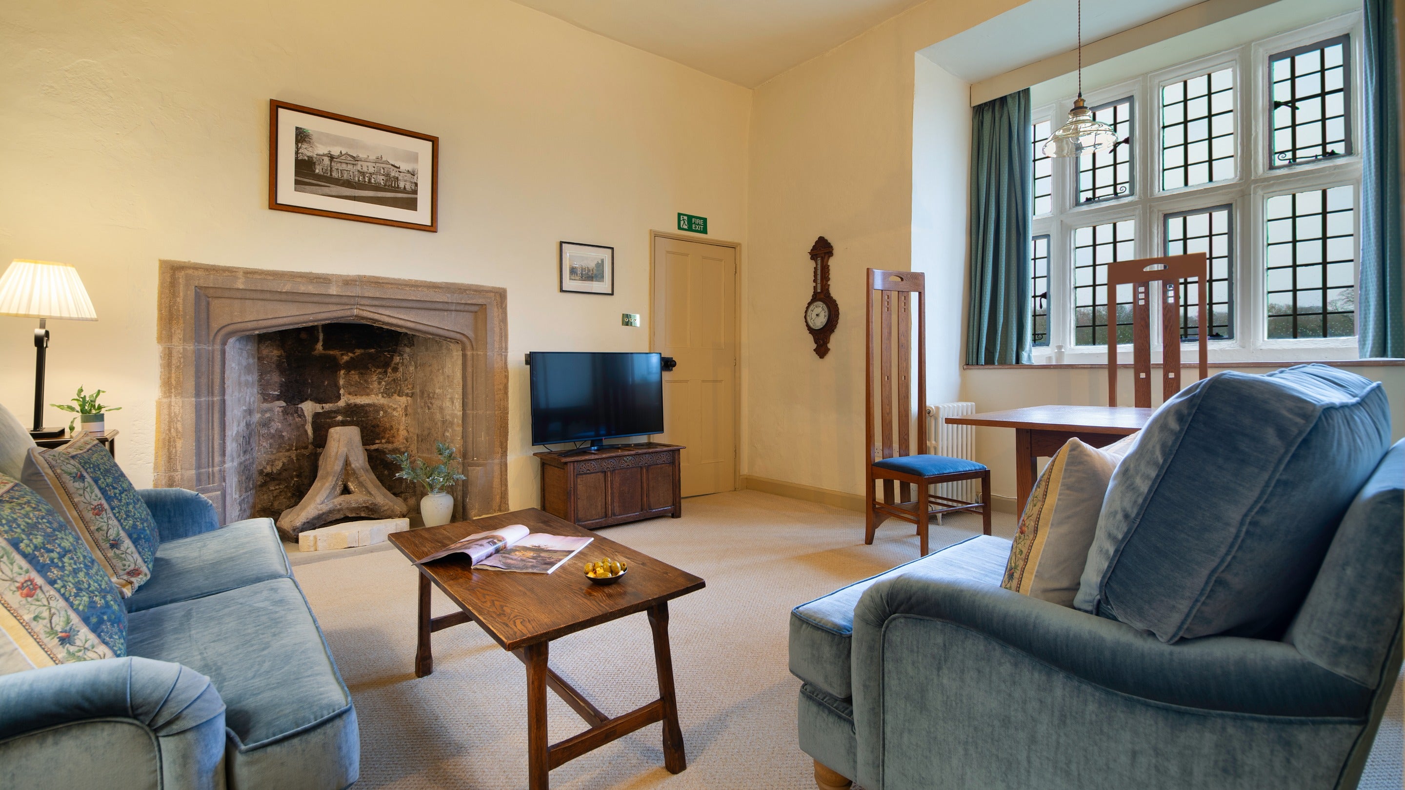 The open-plan sitting and dining room, with large south facing window at Proctor, North Yorkshire