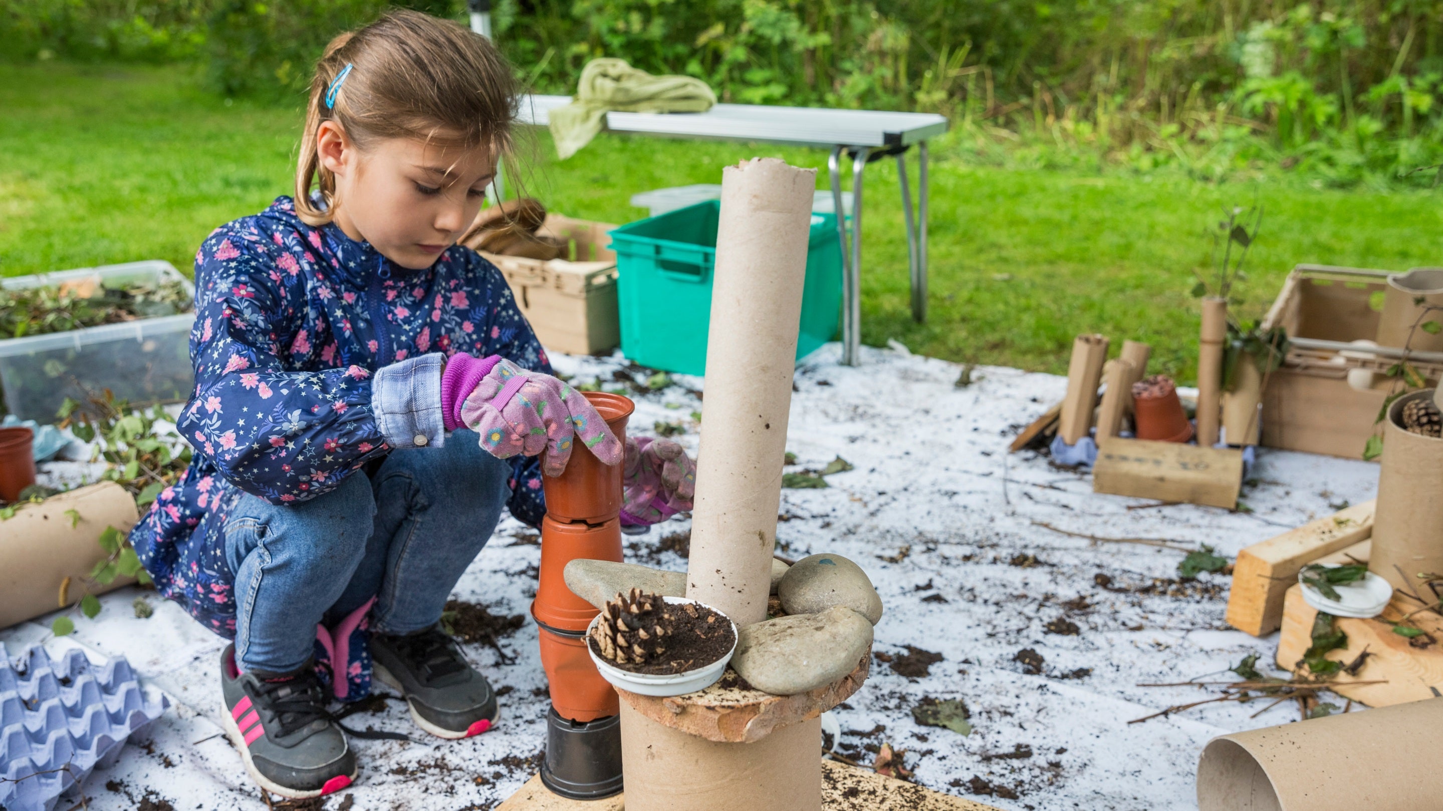 Making bug houses in the garden at Washington Old Hall, Tyne & Wear