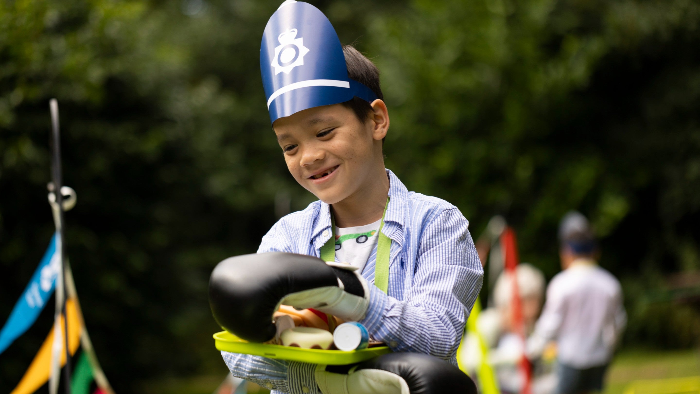 A boy enjoying the summer of play activities at Mottisfont, Hampshire