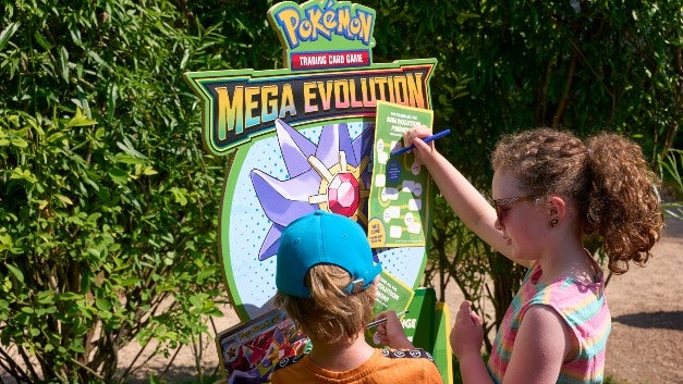 Children doing the Pokémon TCG Mega Evolution Trails