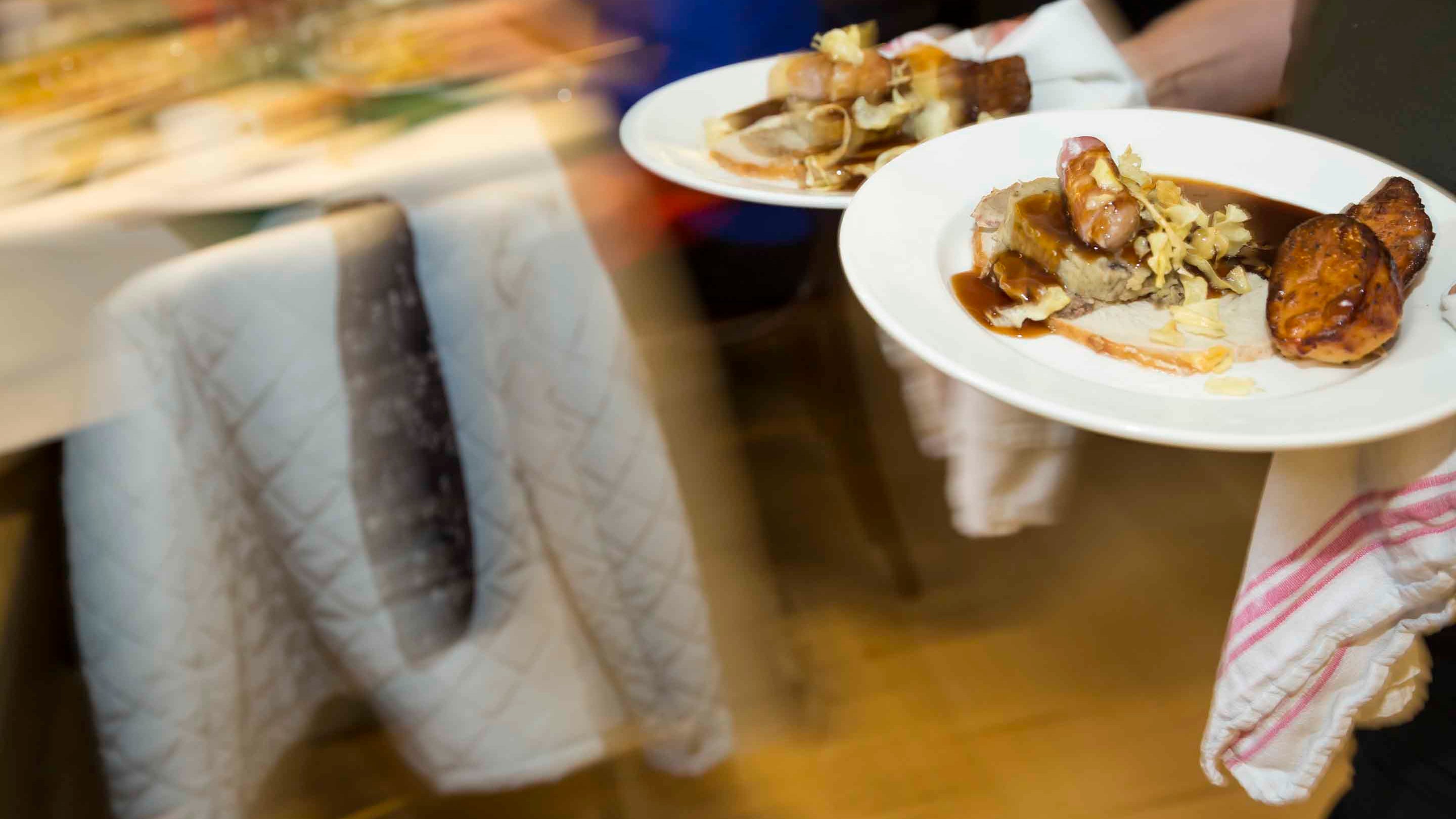 Plates of food being served in a National Trust tearoom