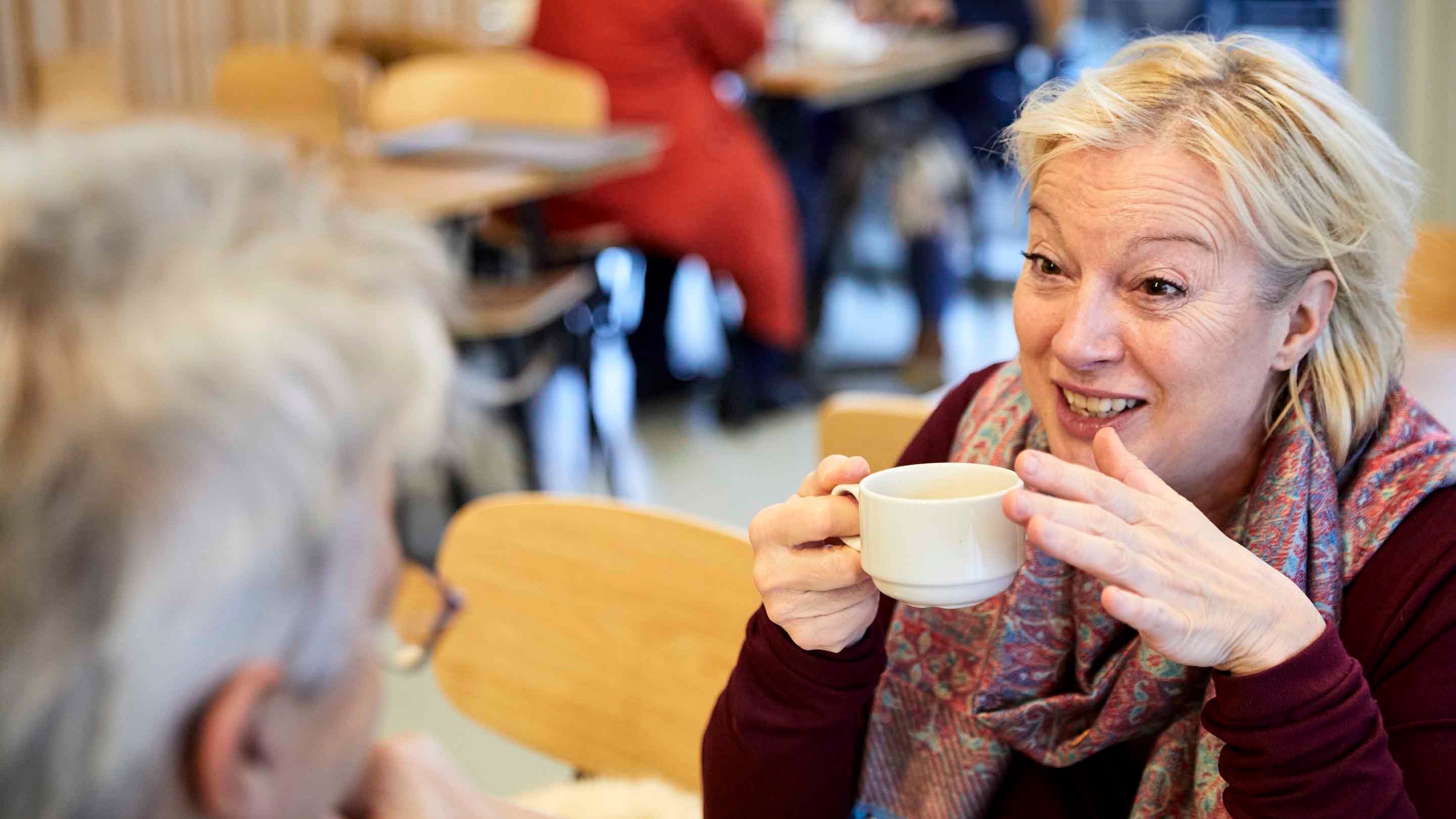 Visitors enjoying a hot drink in the cafe at Stowe, Buckinghamshire