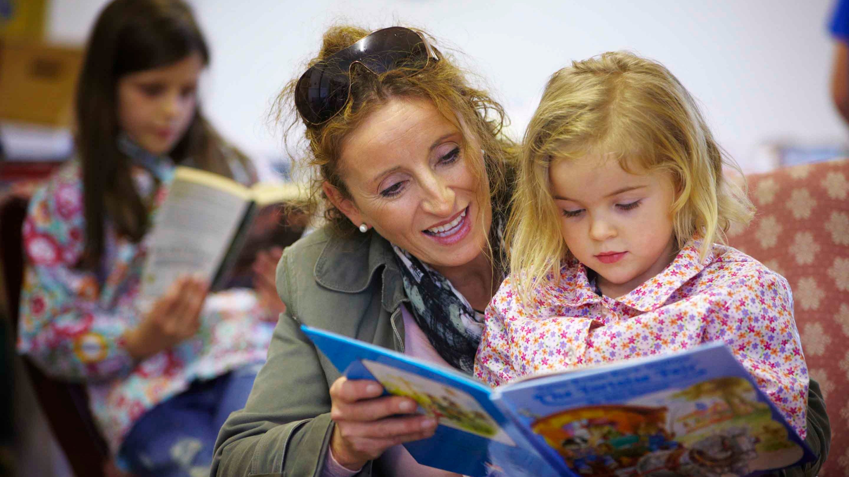 Visitors reading books in the second-hand bookshop at The Argory, County Armagh
