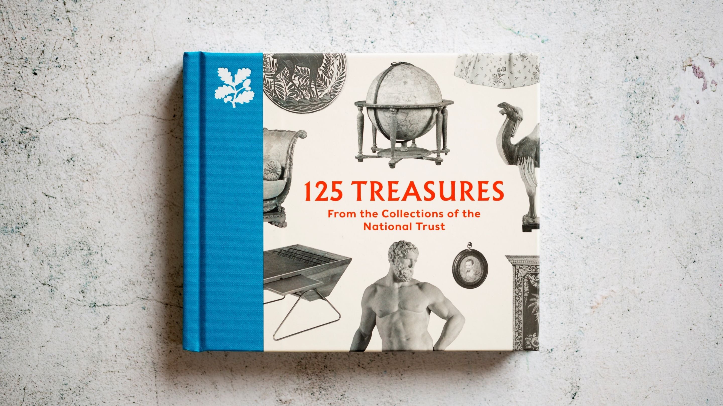Front cover of 125 Treasures, showing images of artefacts and National Trust logo