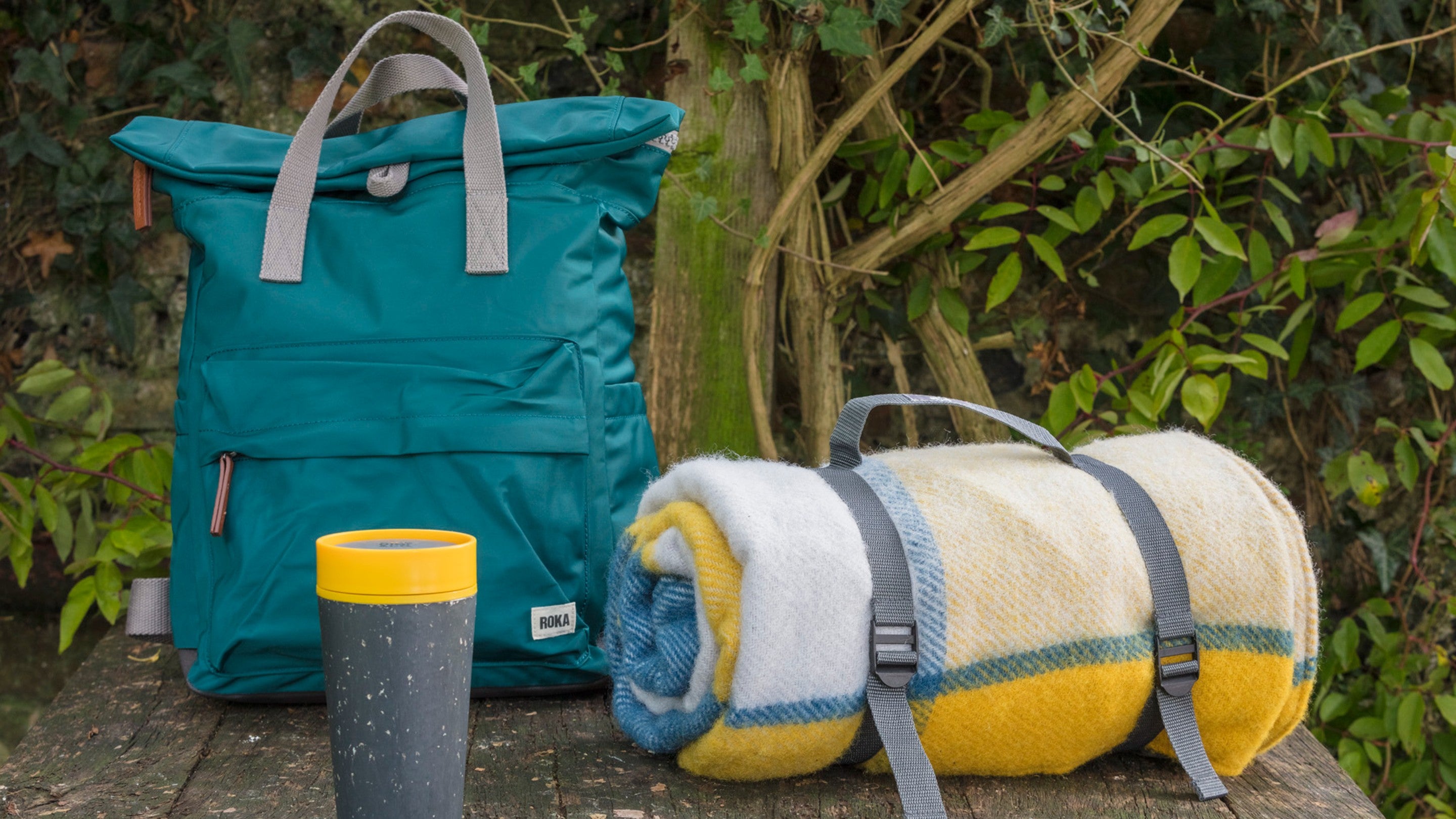 A Roka rucksack, blanket and mug