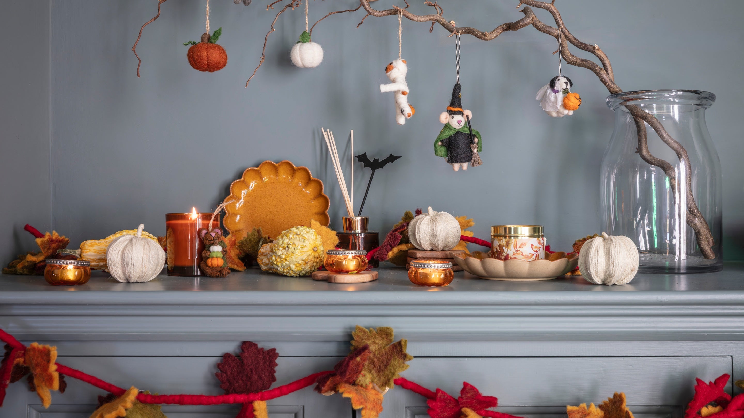 A display of autumnal and Halloween decorations and homeware