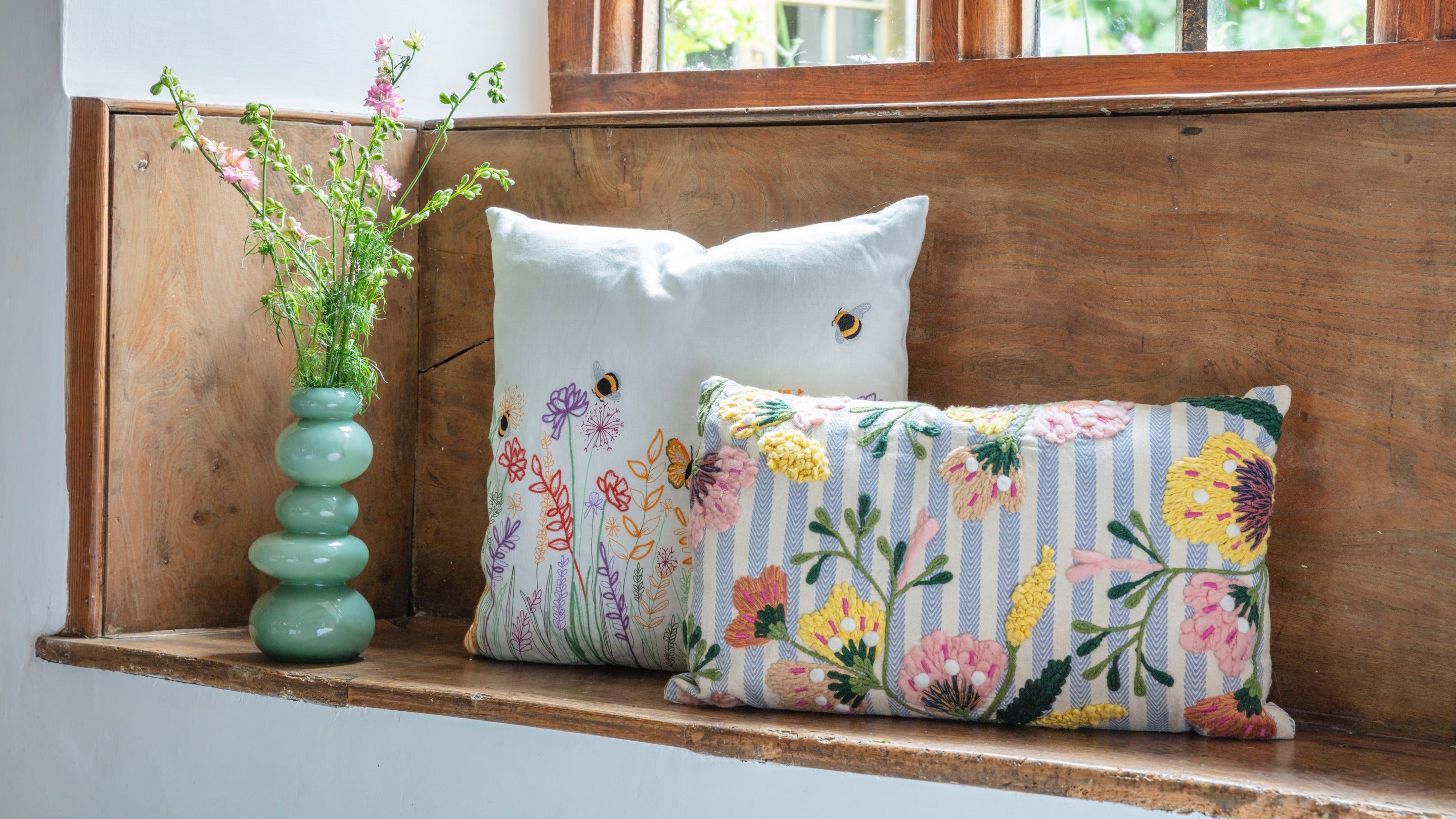 Two floral cushions from the SS24 National Trust retail collection