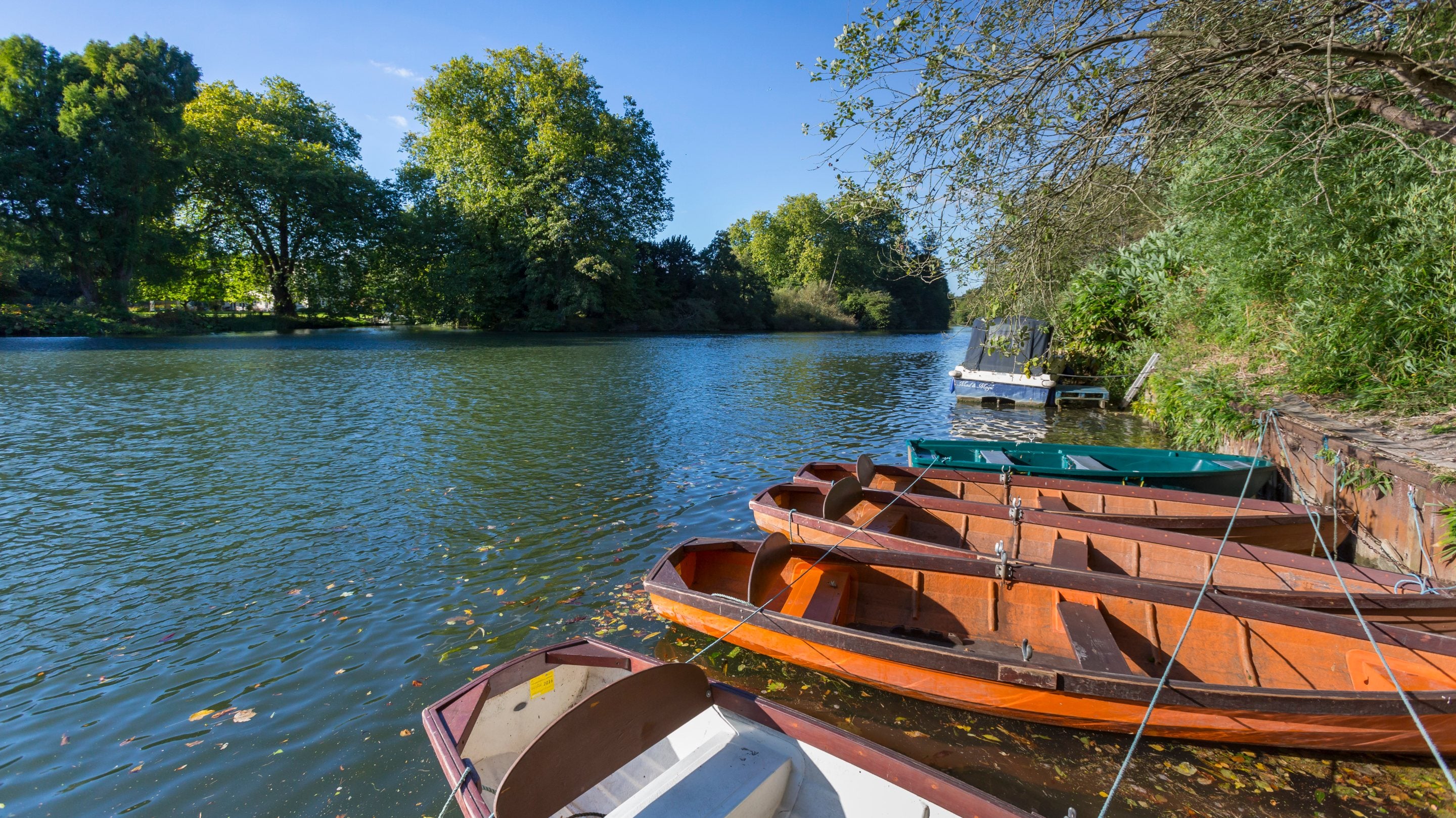 Boats on the River Thames at Ferry Cottage, in Berkshire