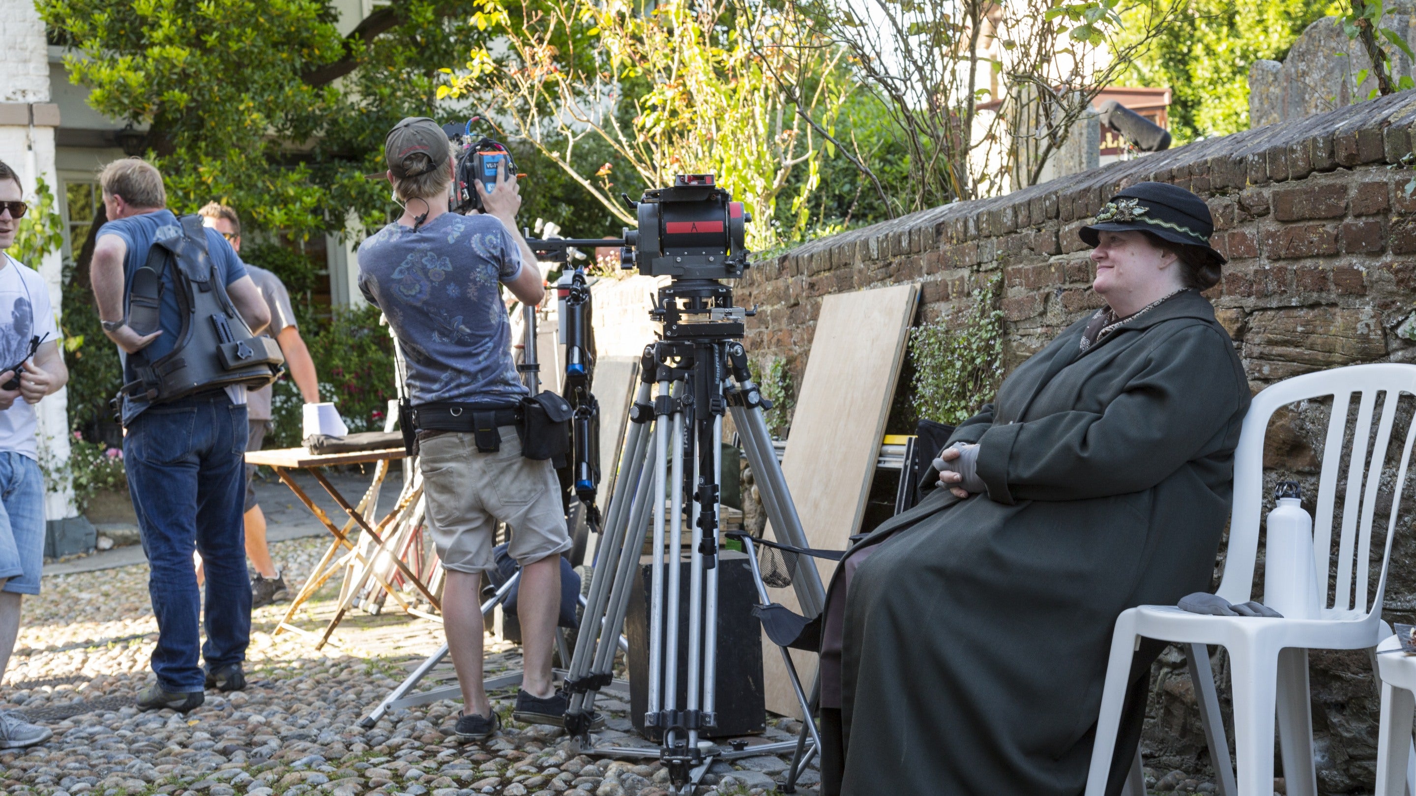 Crew and actors take a break in filming Mapp and Lucia at Lamb House, East Sussex