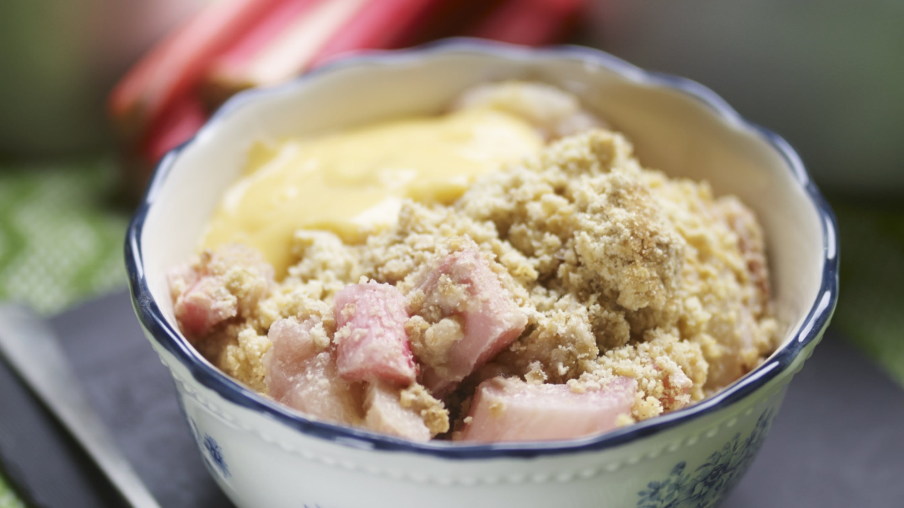 Apple and rhubarb crumble with custard
