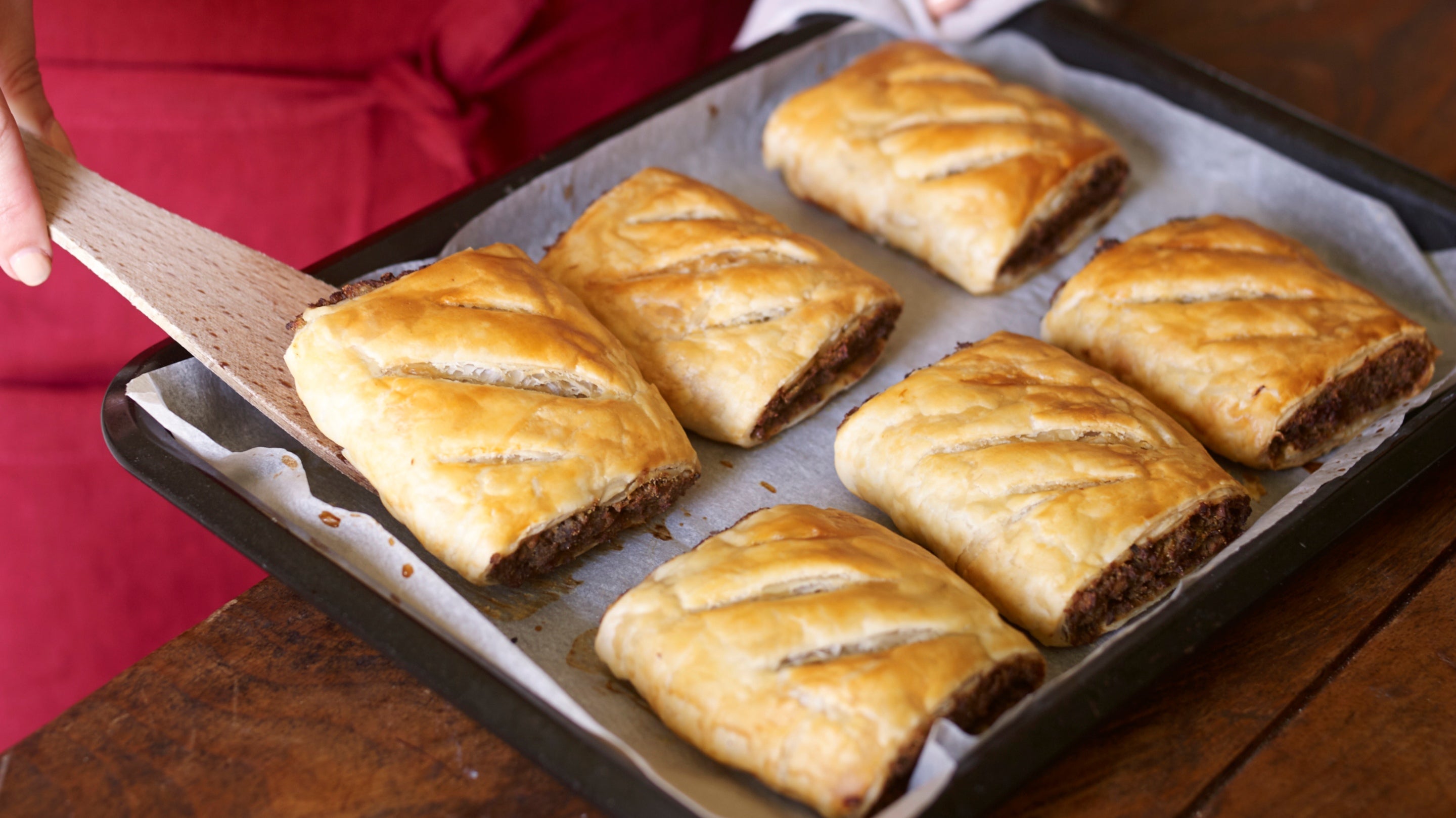 Wild mushroom and thyme rolls, fresh out of the oven on a baking tray