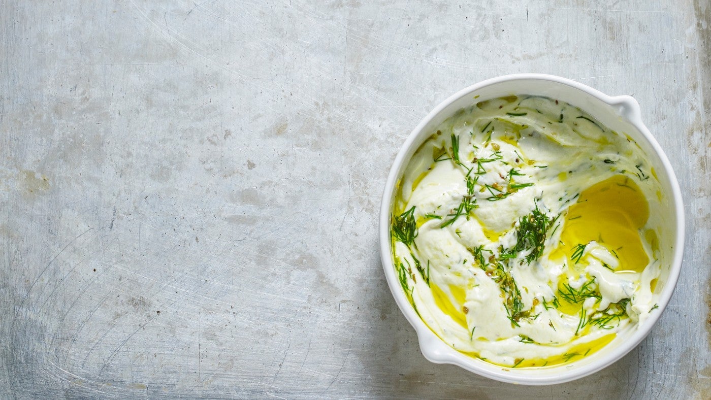 Bowl of Tzatziki finished with oil drizzle