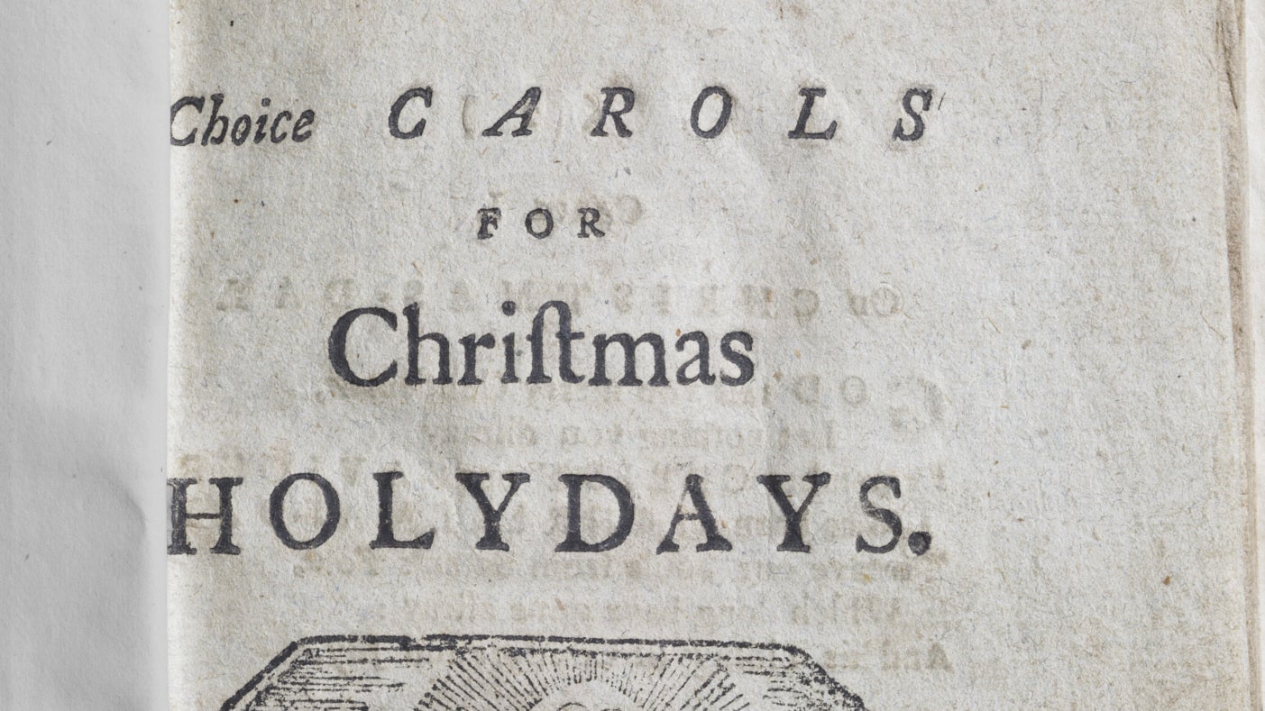 A page from an old Christmas carol hymn book with the words 'Choice carols for Christmas Holidays' written in various old scripts.