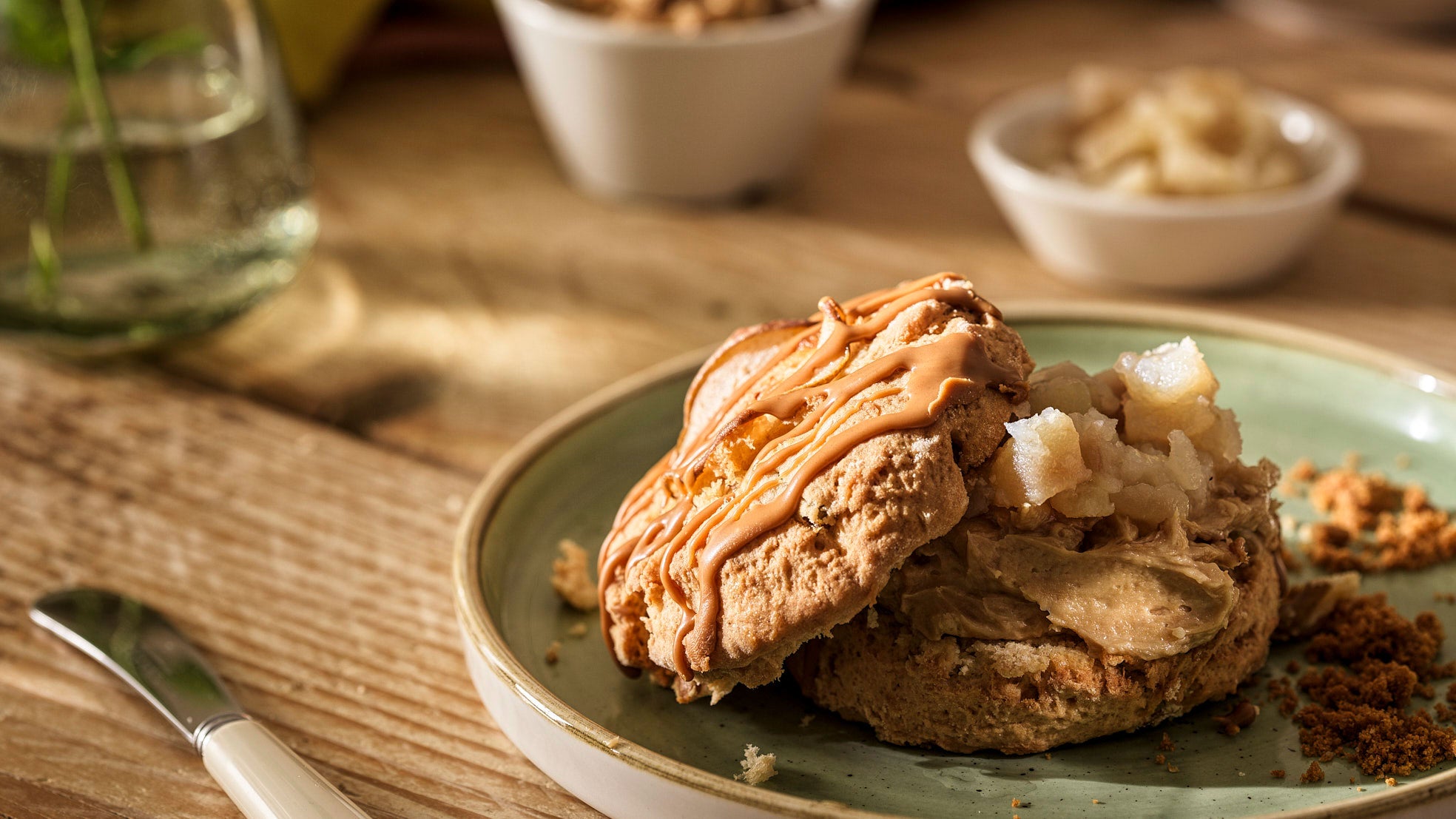 Pear and caramelised biscuit scones with caramelised biscuit clotted cream and pear compote