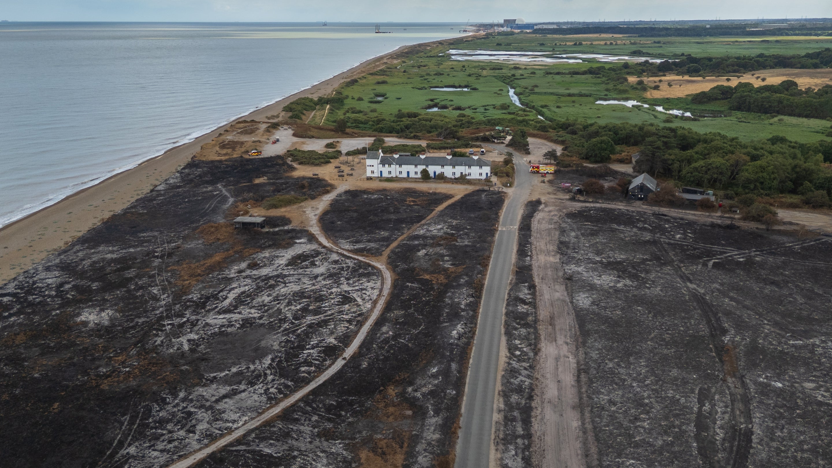 Aerial shot of fire damage on the lead up to Coastguard Cottages at Dunwich Heath, Suffolk