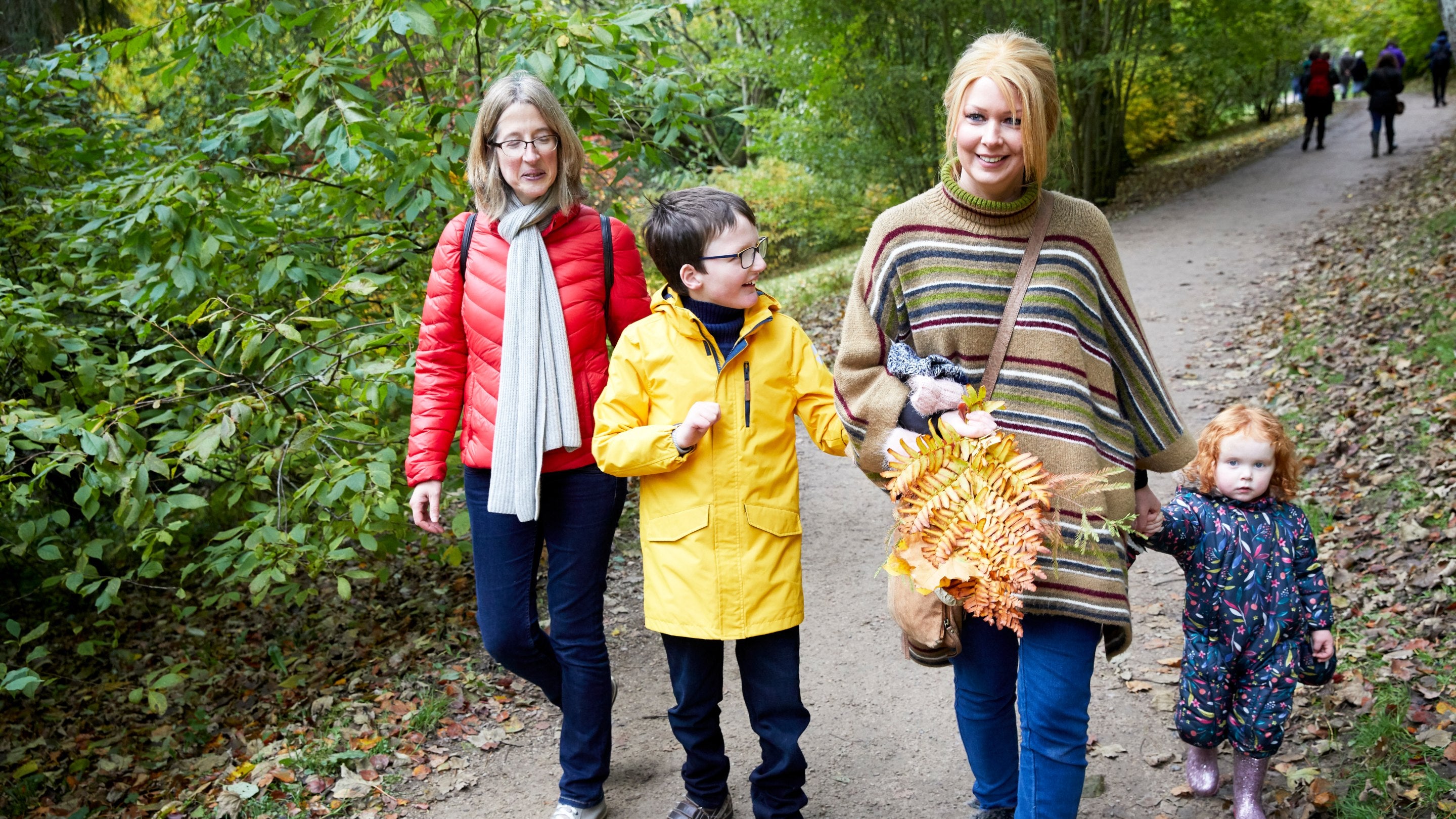 Visitors in the garden in October at Stourhead, Wiltshire