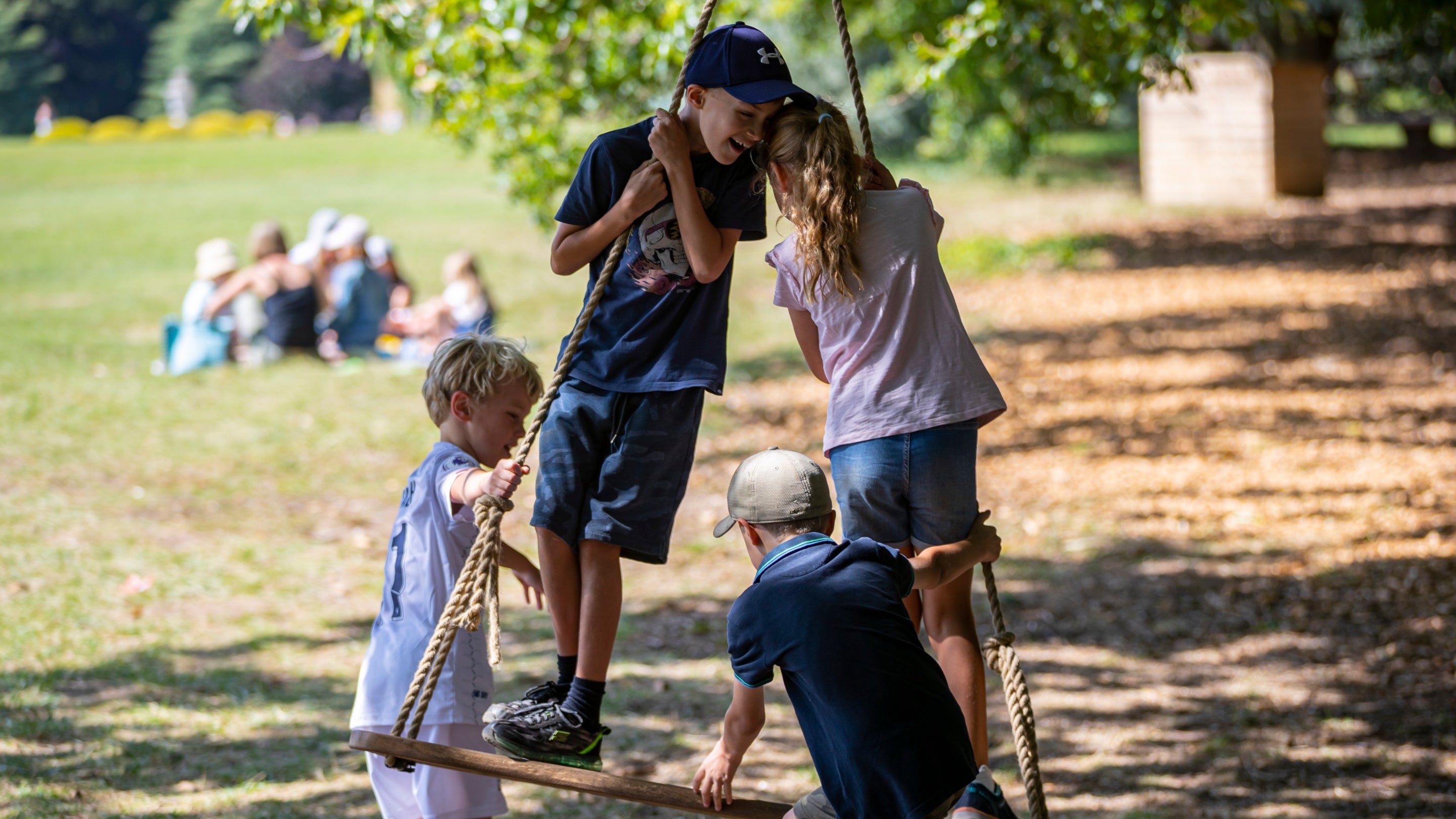 Visitors in the natural play area in August at Polesden Lacey, Surrey