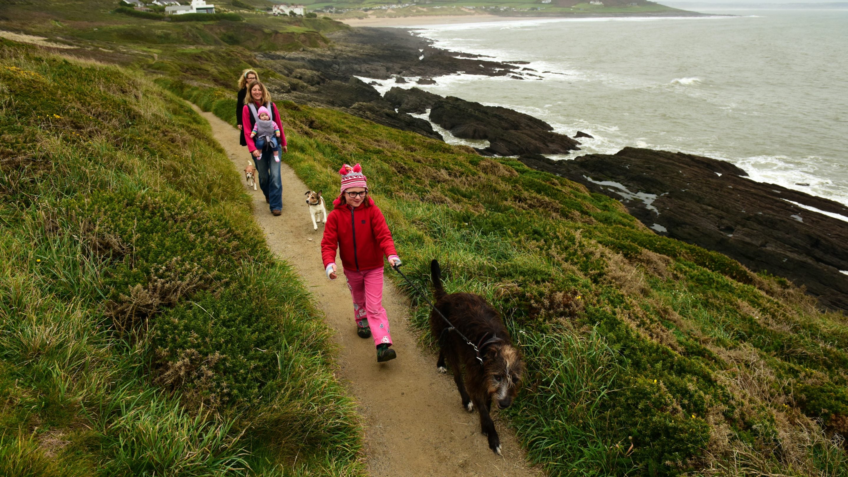 Visitors on a walk at Baggy Point, Devon