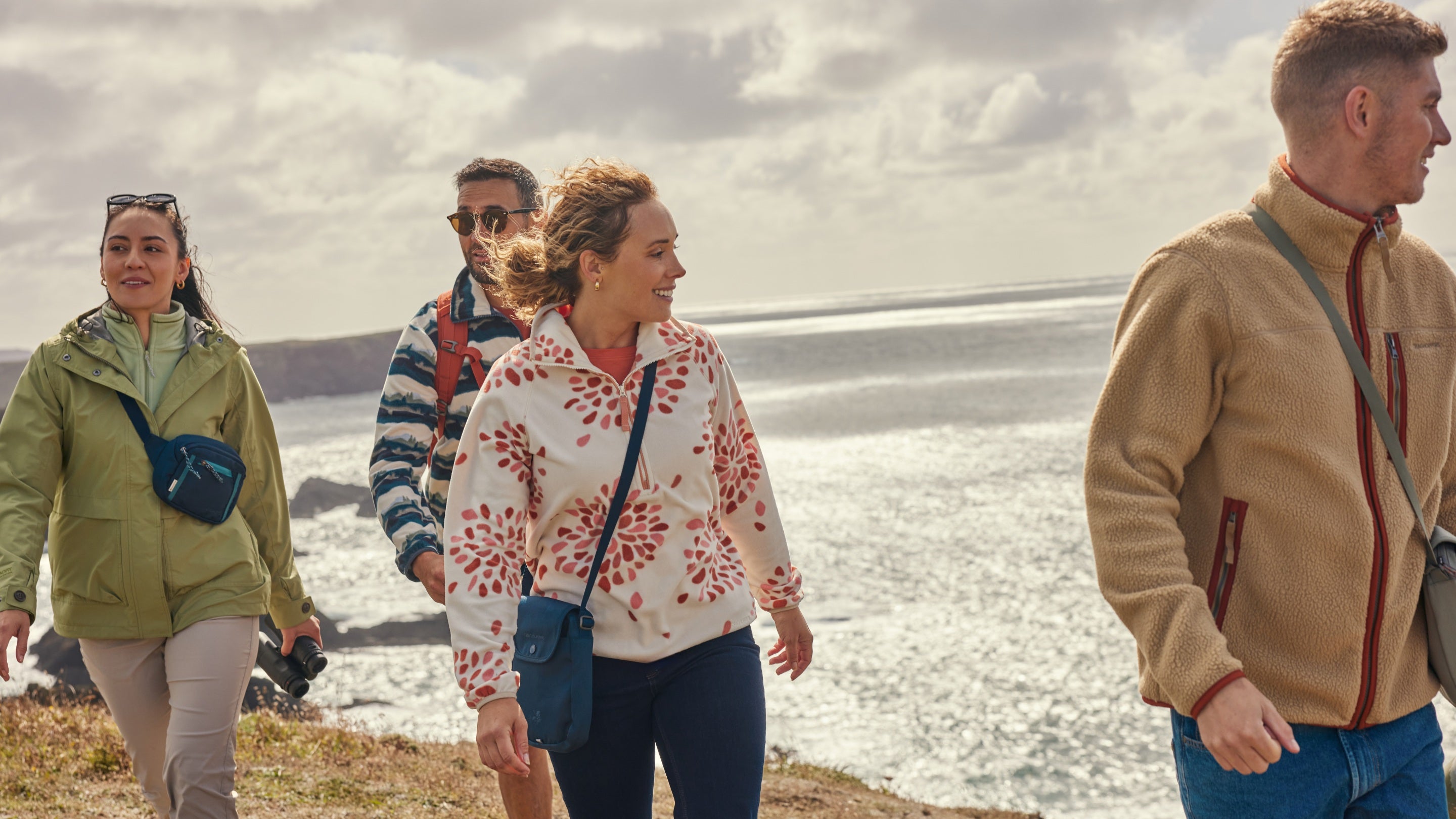 A group of people on the coastal walk at Marloes Sands and Mere, Pembrokeshire