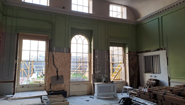 A view of the windows at the end of the Card Room. The top of the windows have been stripped back and put back, the bottom of the sash is still empty.