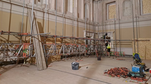 A row of scaffolding is on place on the floor in the Tea Room, most of the walls and all of the ceiling are still yet to be covered as work has only just begun on installing the scaffolding.