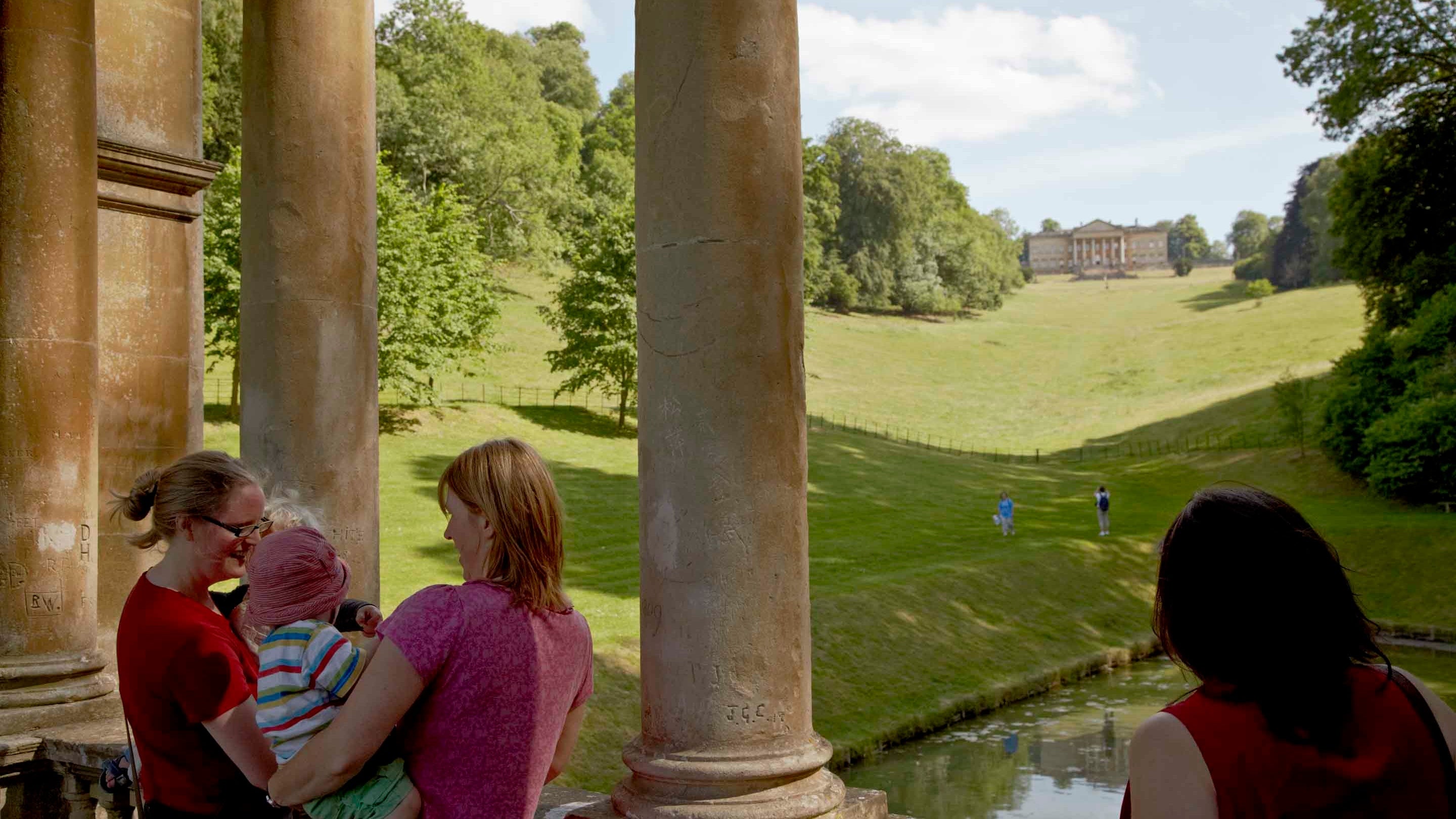 Visitors on the Palladian Bridge at Prior Park Landscape Garden, Bath, Somerset