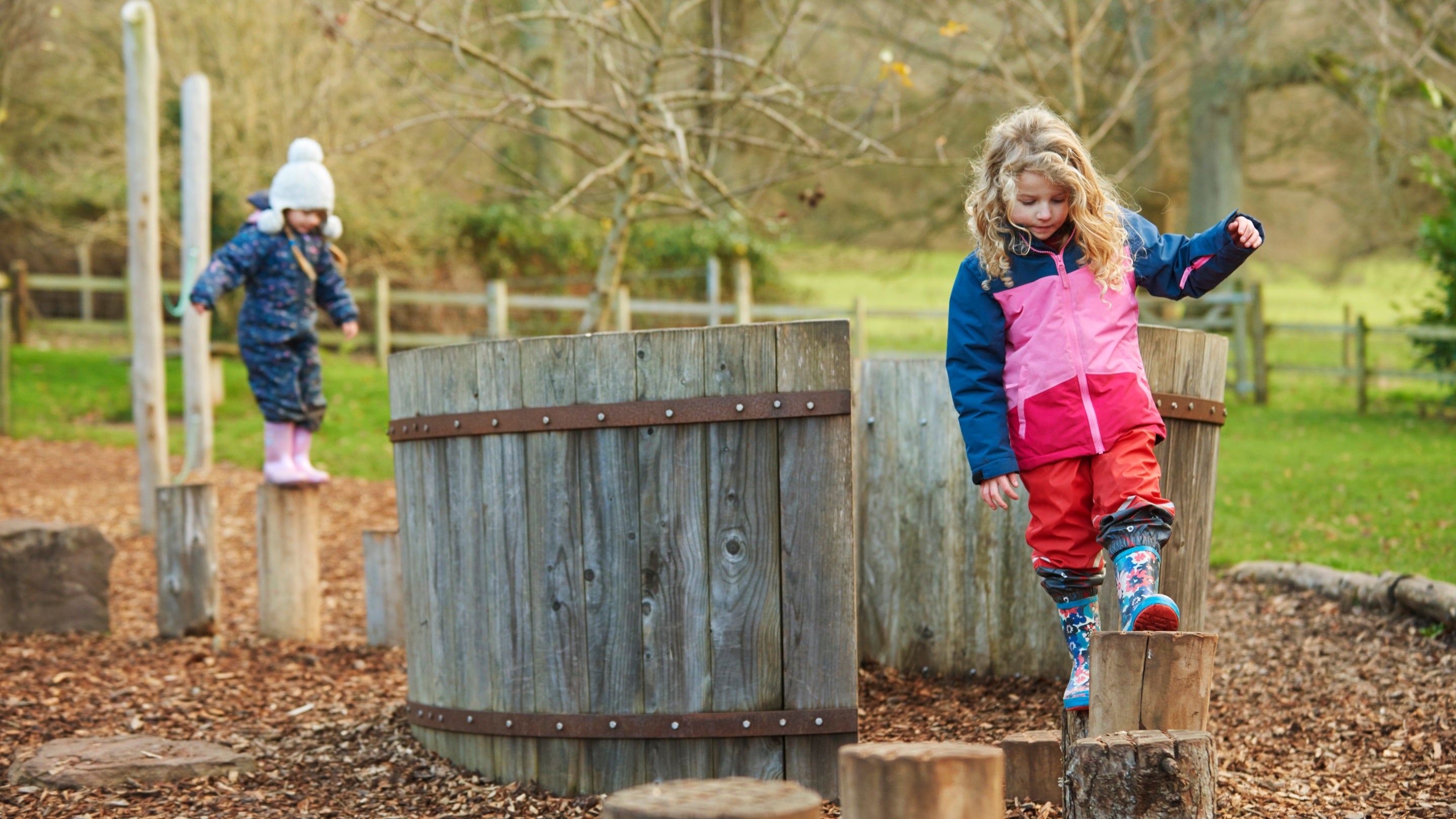 Children in the play area at Tyntesfield, Somerset in winter