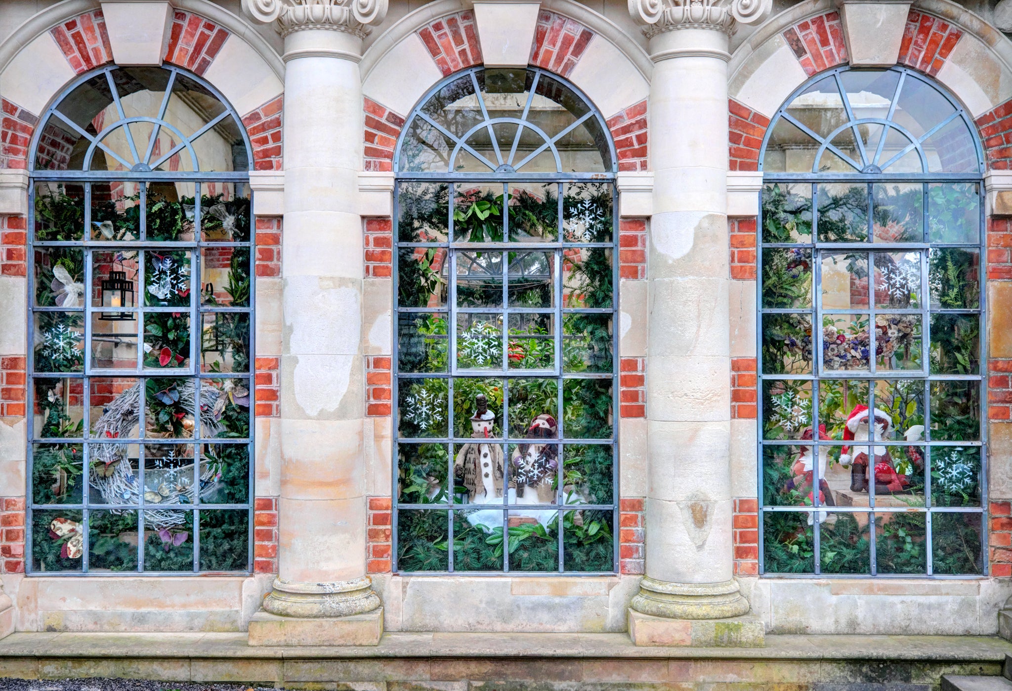 Christmas nature scene through the orangery windows