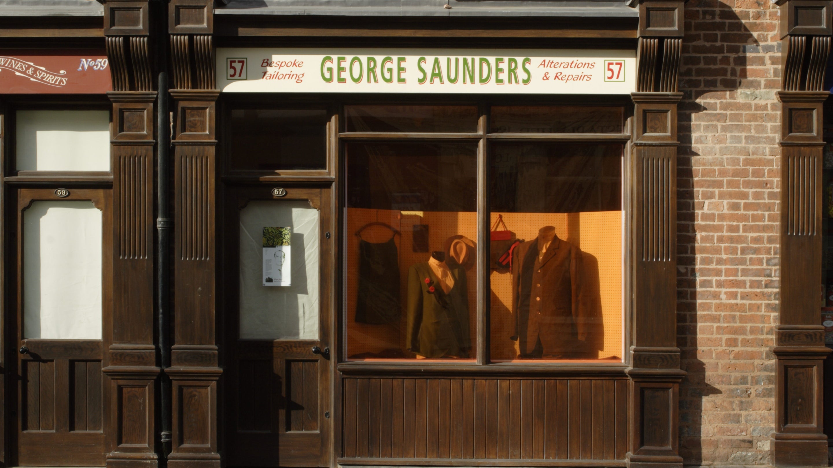 The historic shopfront of George Saunders, the tailors, on Hurst Street as part of the Birmingham Back to Backs, West Midlands