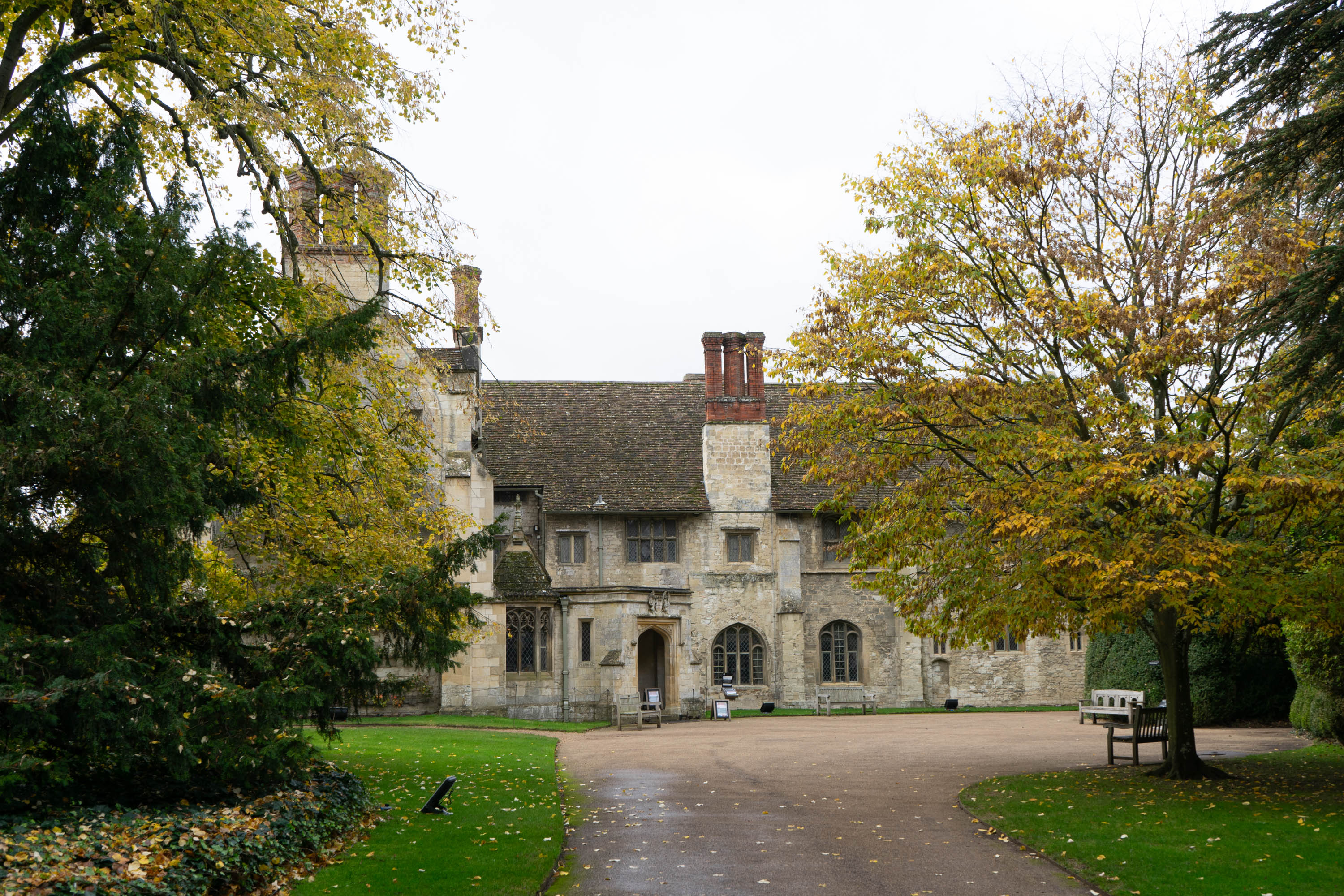 An autumnal view of the turning circle by the house at Anglesey Abbey.