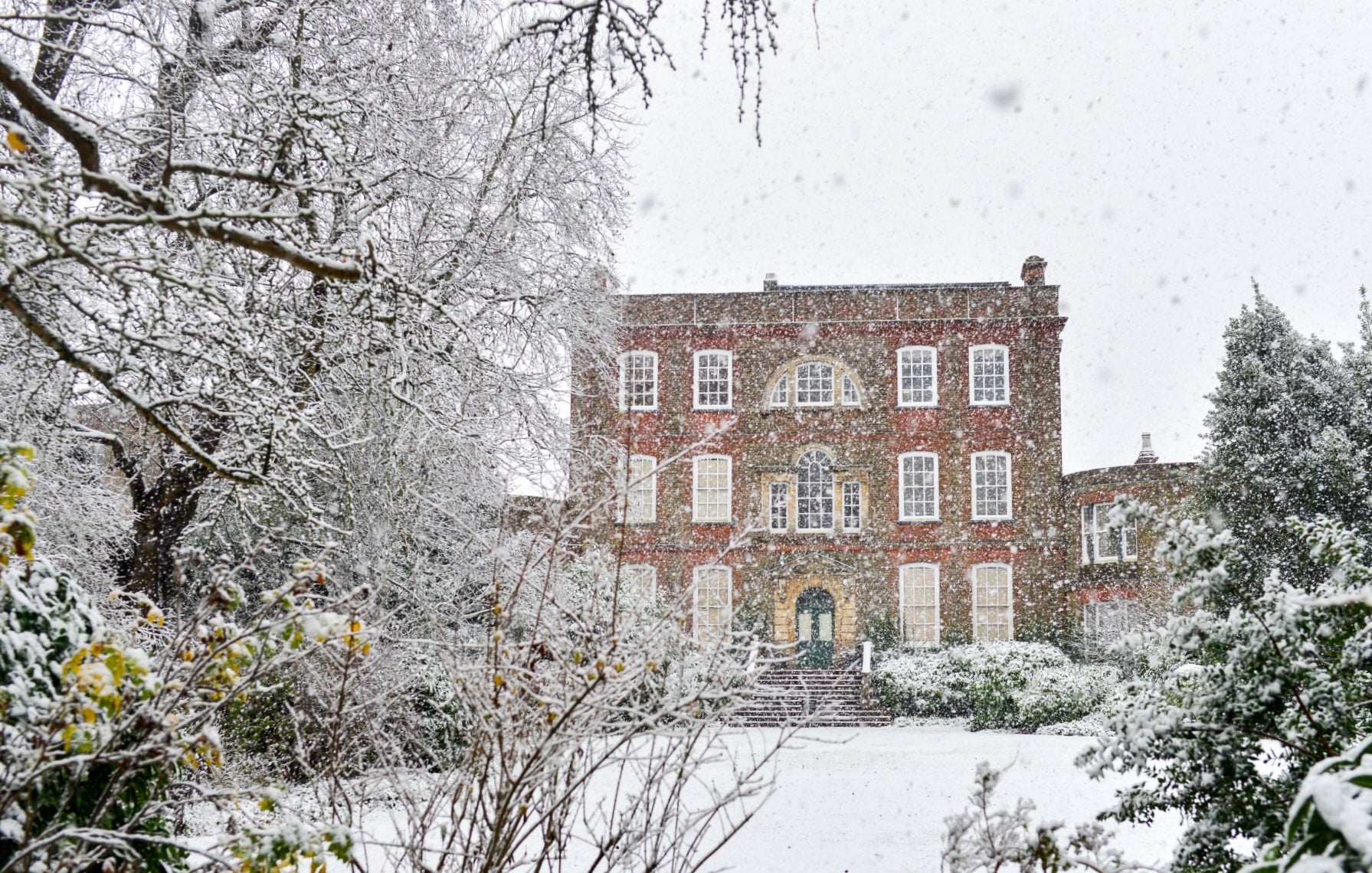 Peckover house in a flurry of snow