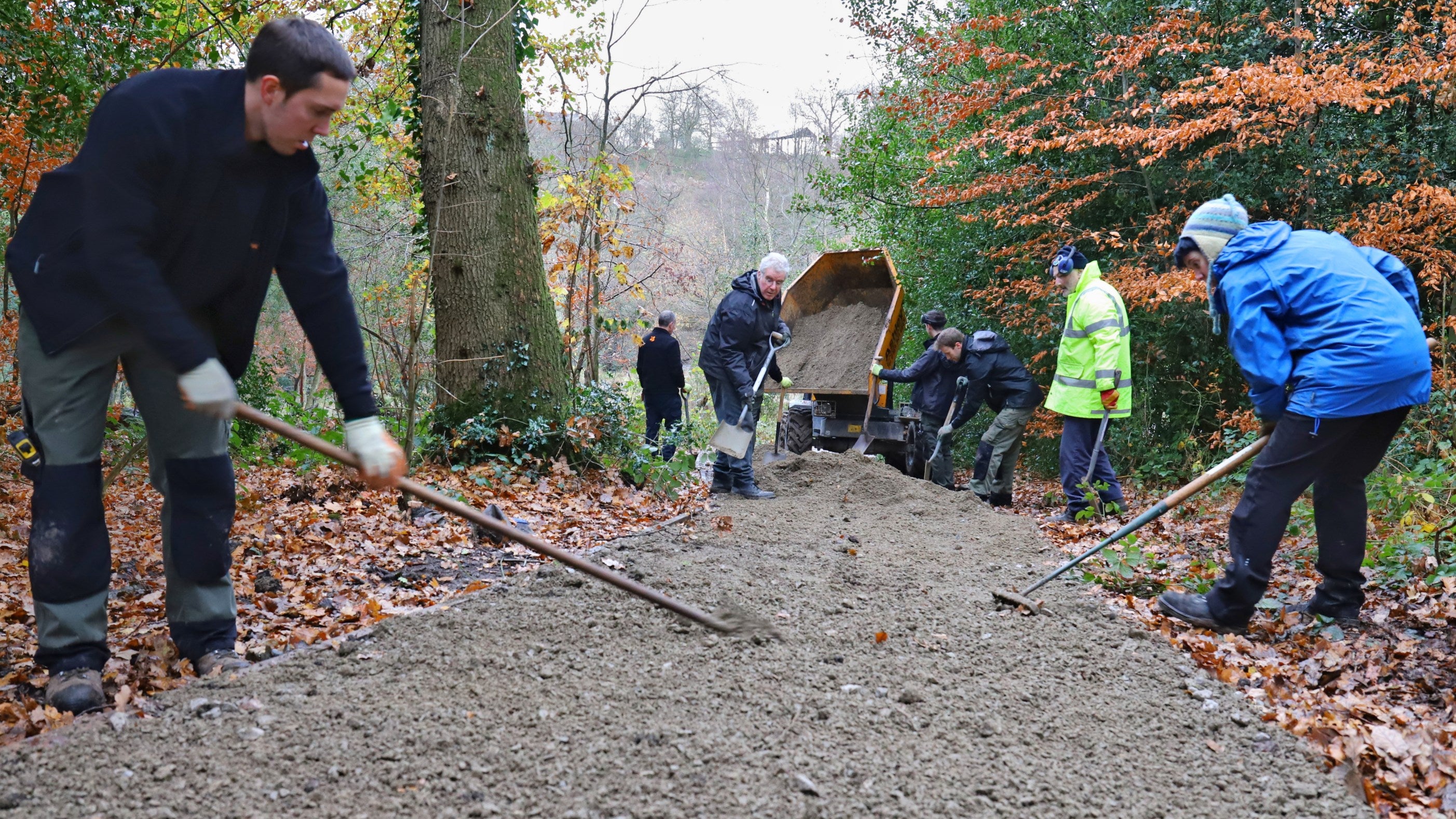 Volunteers laying gravel