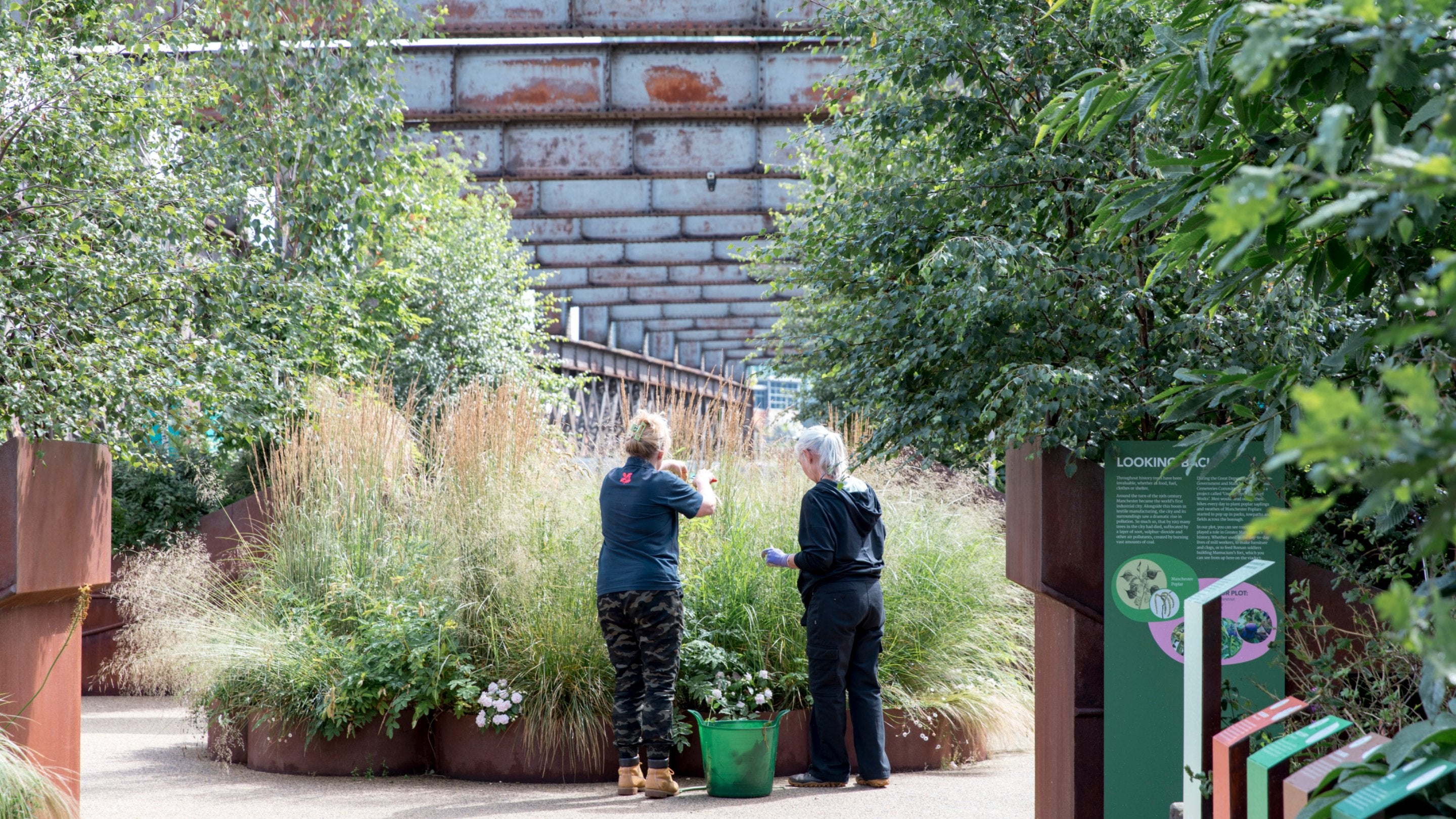 Gardeners at work at Castlefield Viaduct, Greater Manchester
