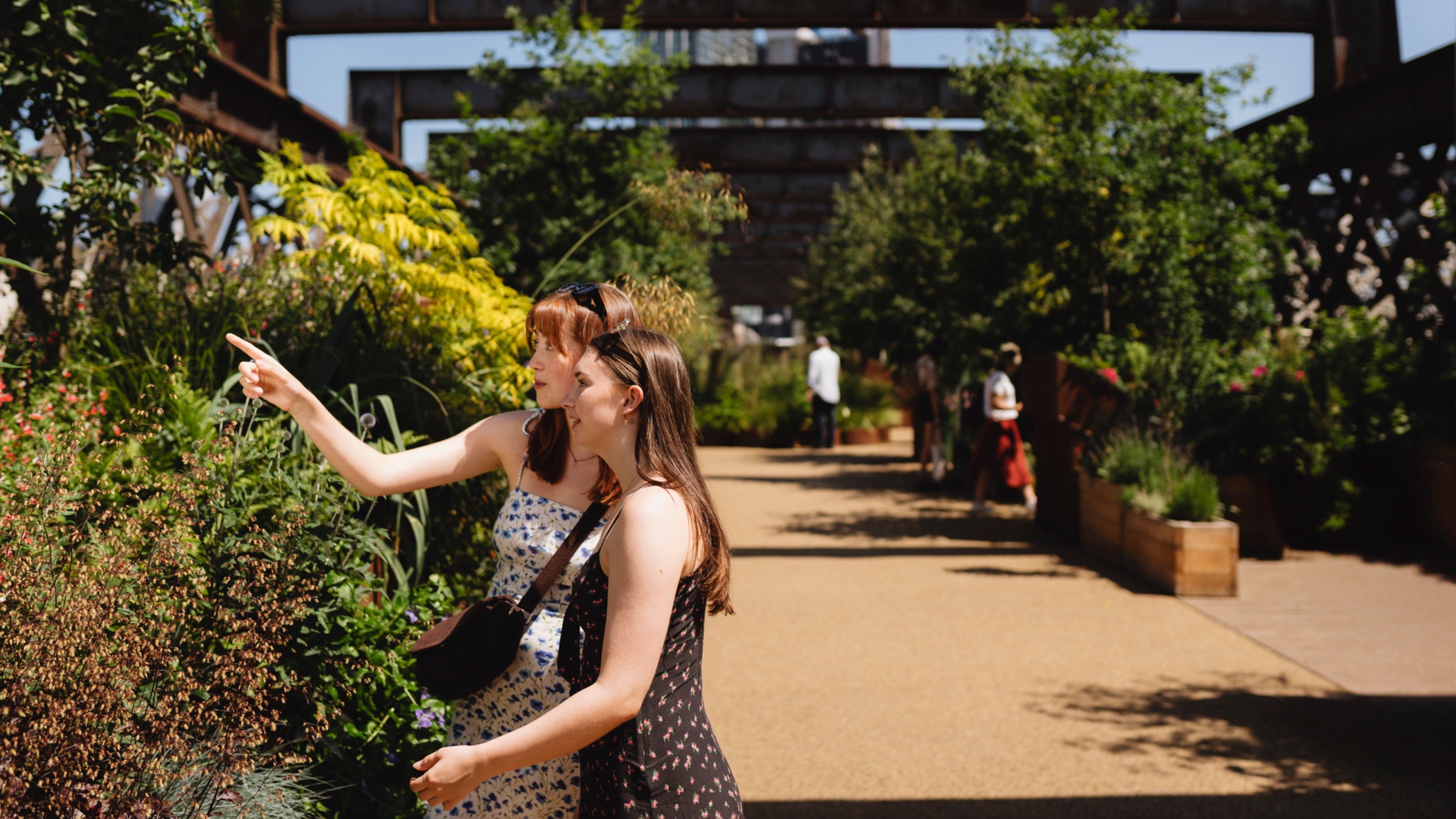 Visitors to Castlefield Viaduct in the summer