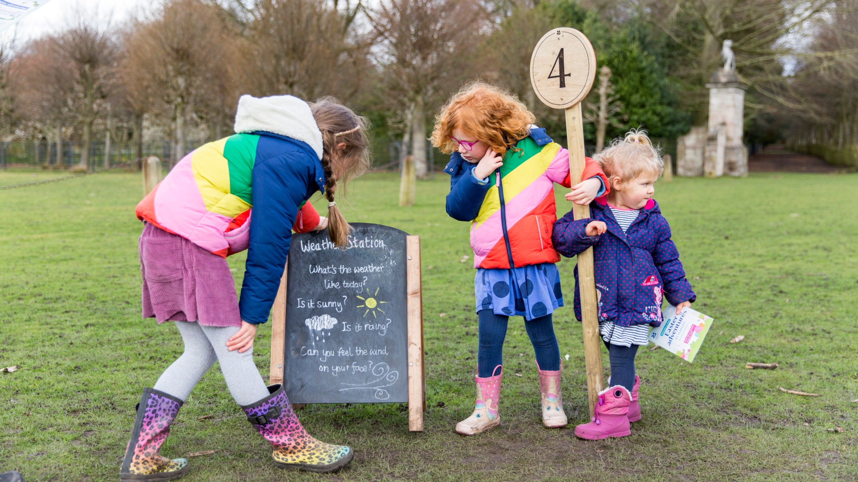A group of children enjoying the Easter trail at Dunham Massey, Cheshire