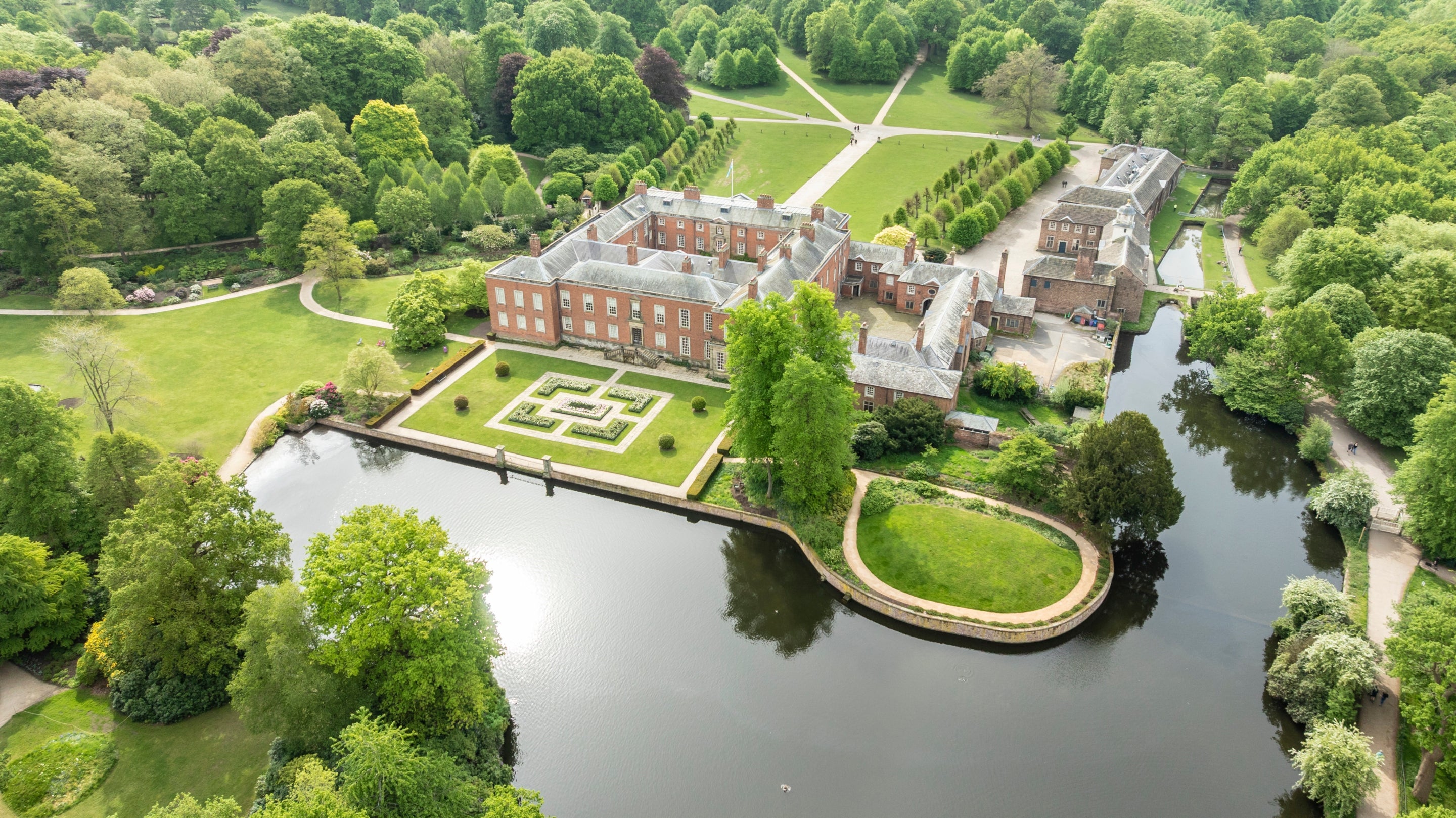 An aerial view of Dunham Massey in summer