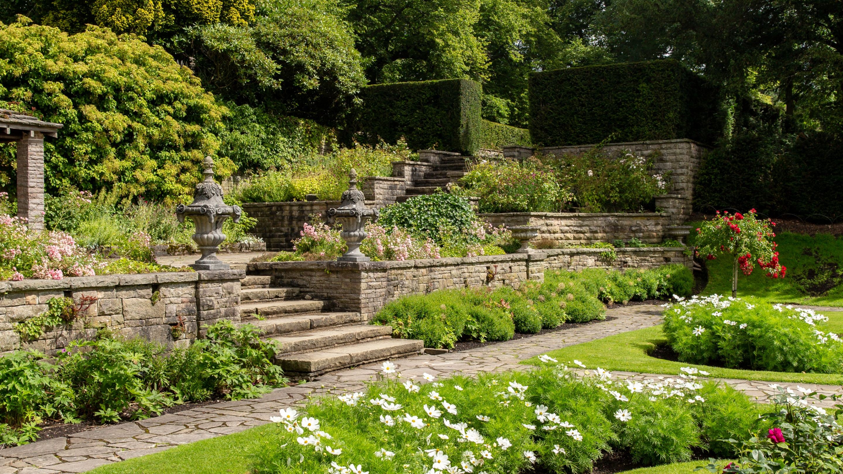 View of the Orangery Terrace in the garden at Lyme Park, Cheshire on a sunny day