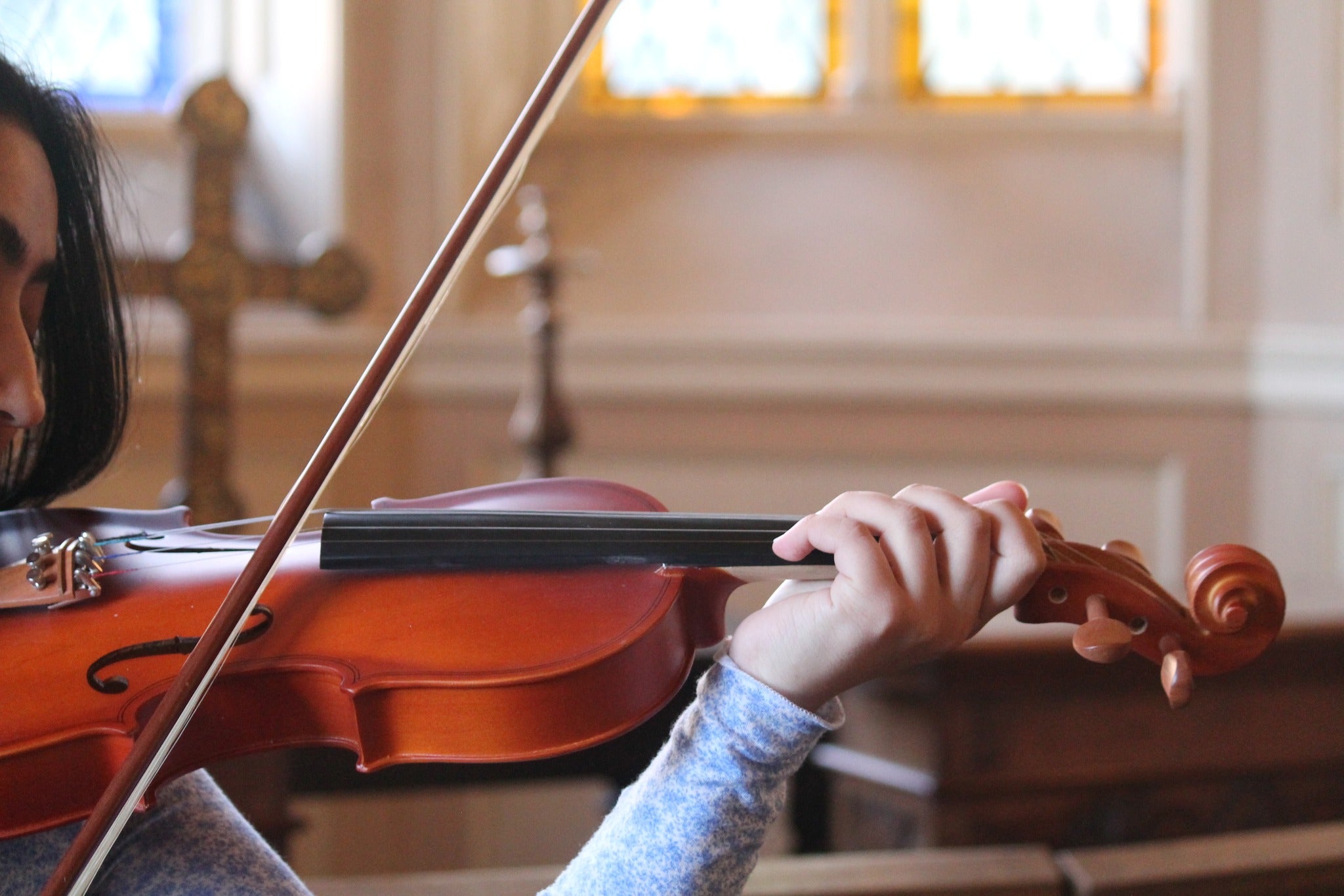 A women playing a violin at Lyme, Cheshire