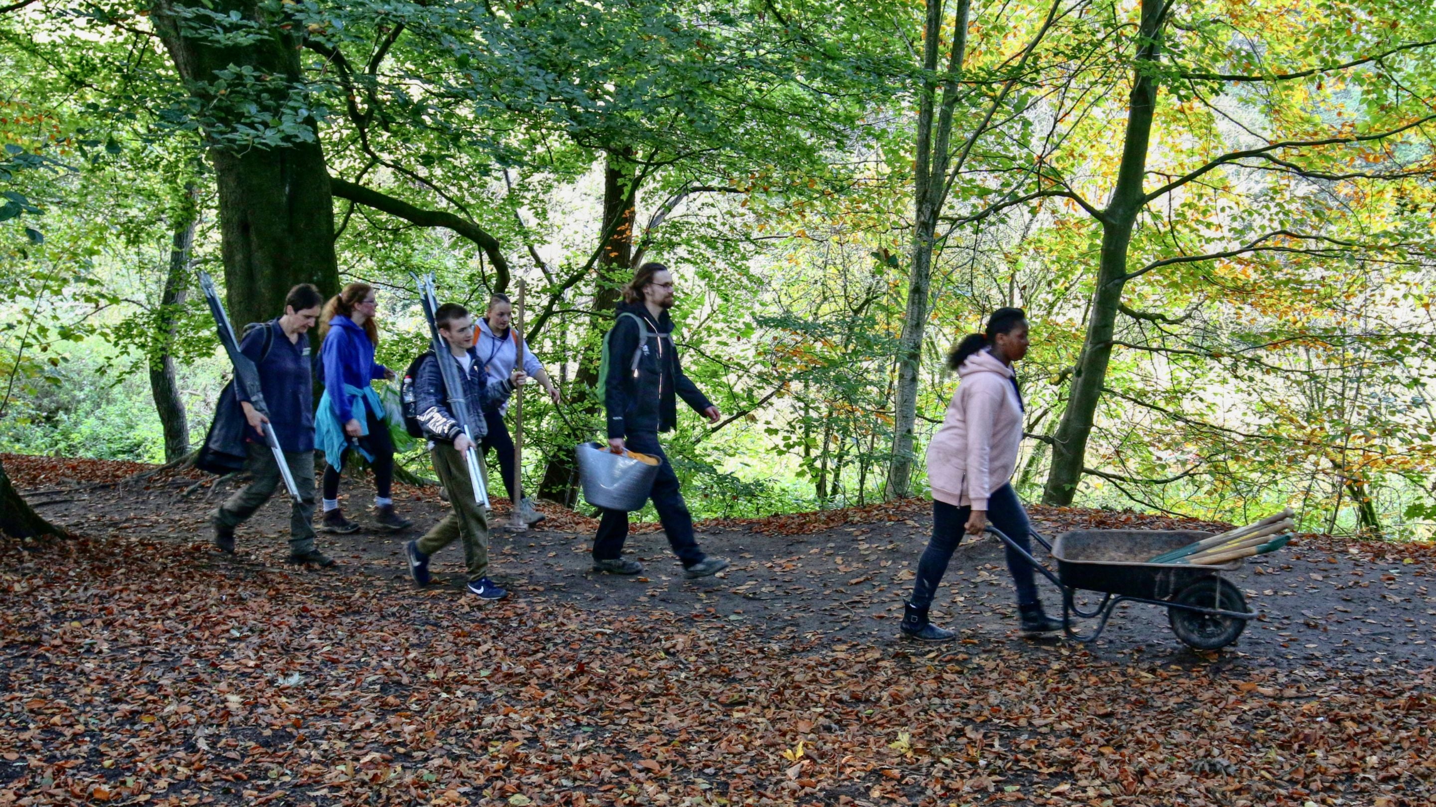 Green academy programme volunteers on a path repair project at Quarry Bank Mill, Cheshire