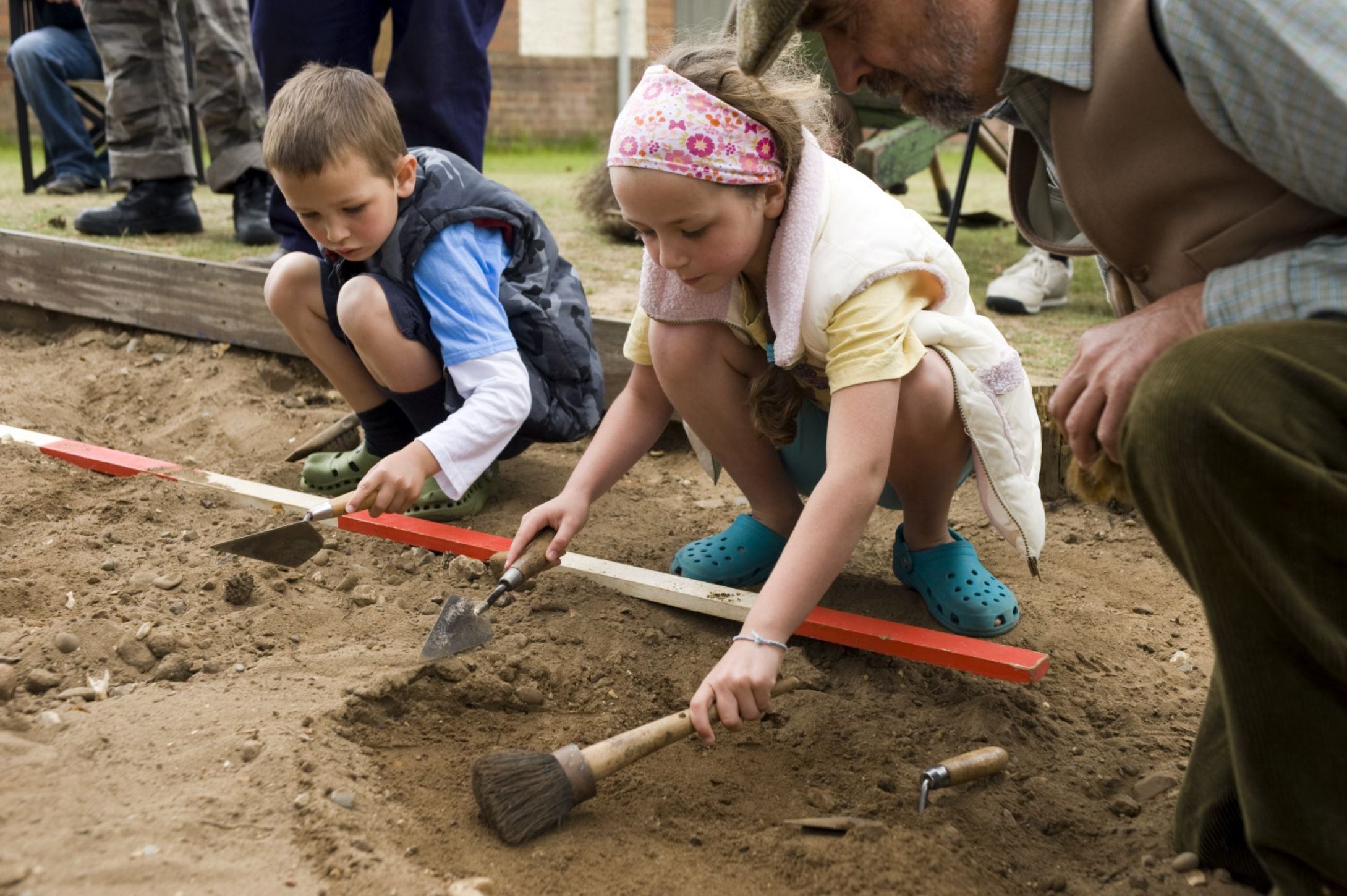 Children taking part in an Archaeological dig
