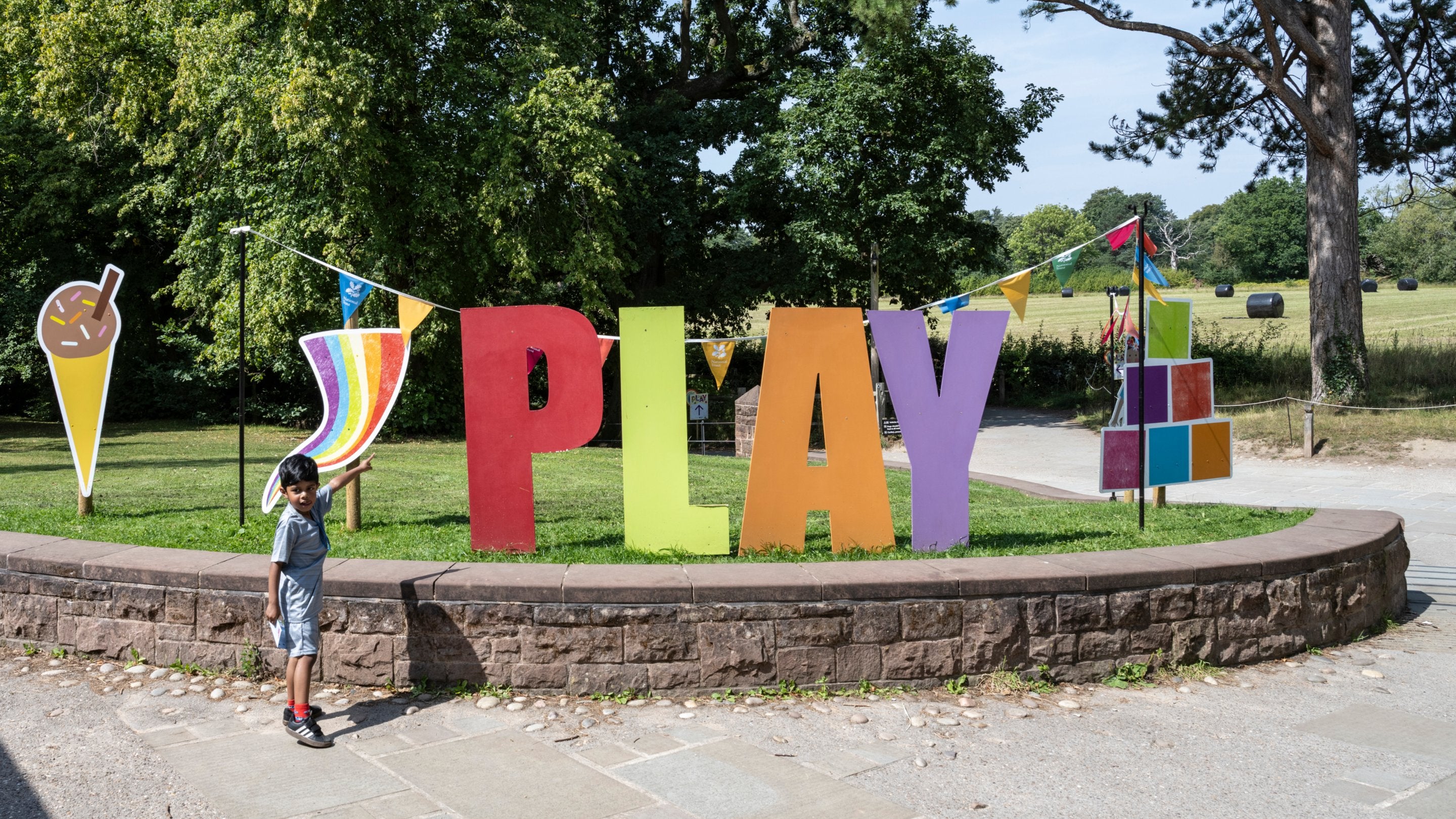 Giant, multi-coloured letters that spell out play
