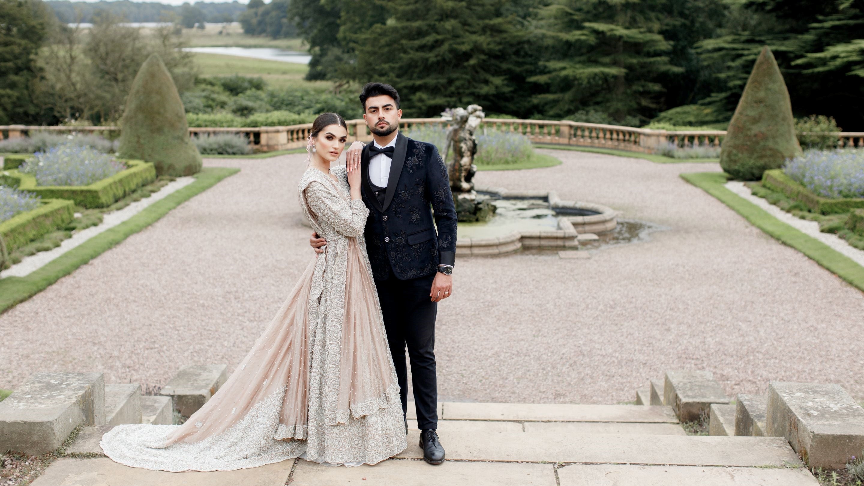 Wedding couple with the Italian Terrace in the background, Tatton Park, Cheshire