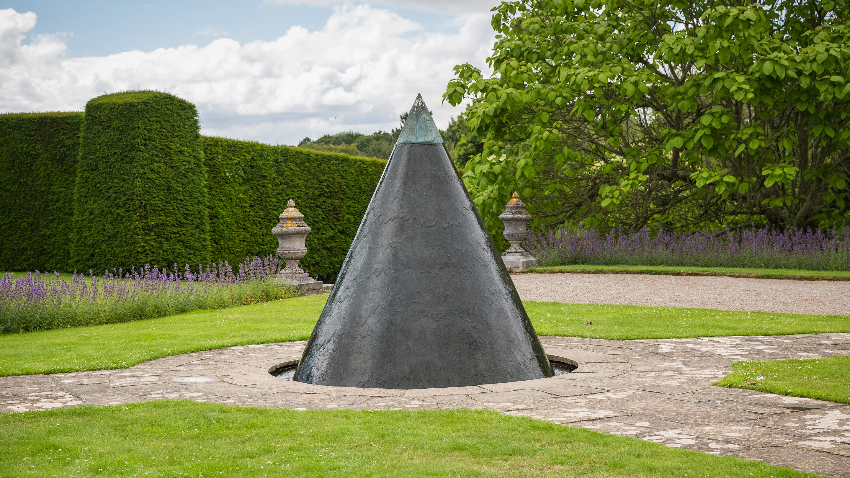 Conical water fountain in the garden at Antony House, Cornwall