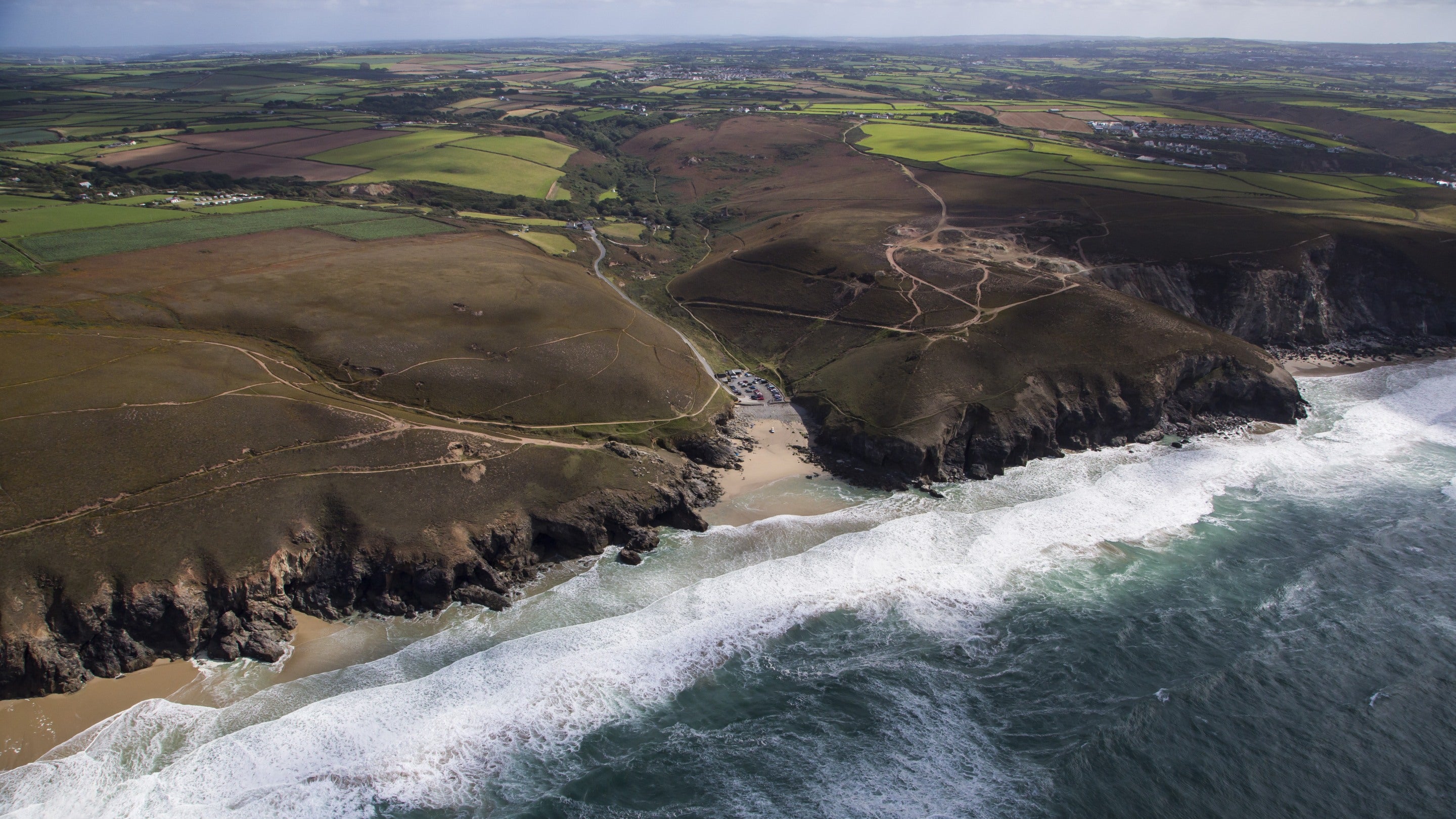 Aerial view of Chapel Porth and Wheal Coates in autumn in Cornwall.